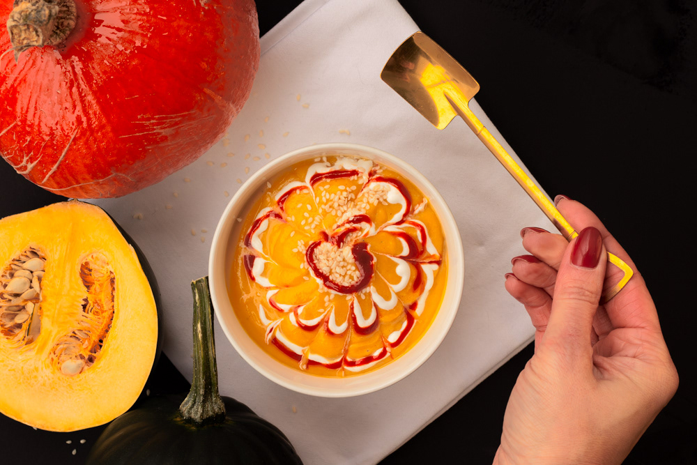 Pumpkin soup with sour cream and shiracha