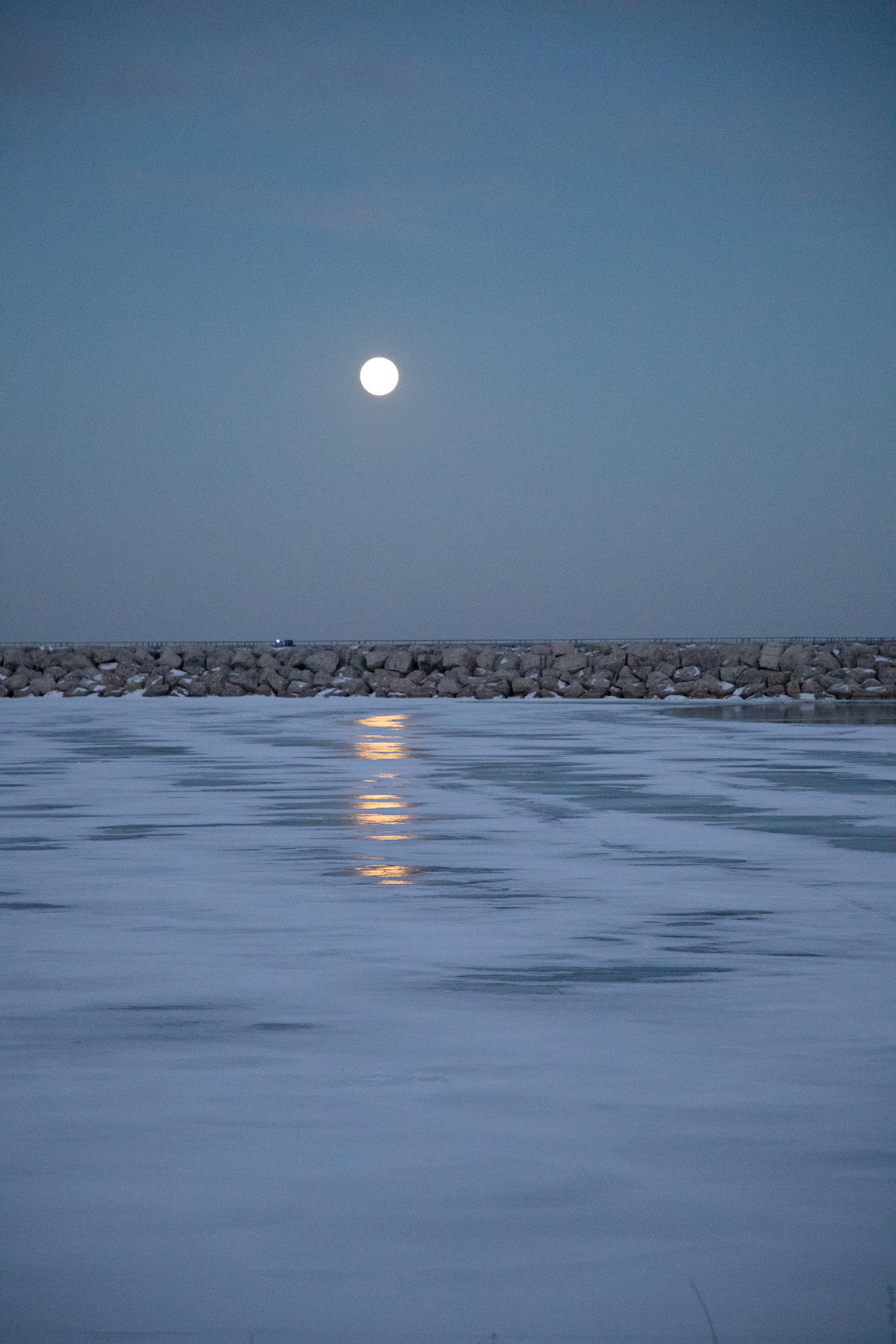Winter Moonlight defining the shoreline February 1, 2026 — Discovery World, Milwaukee