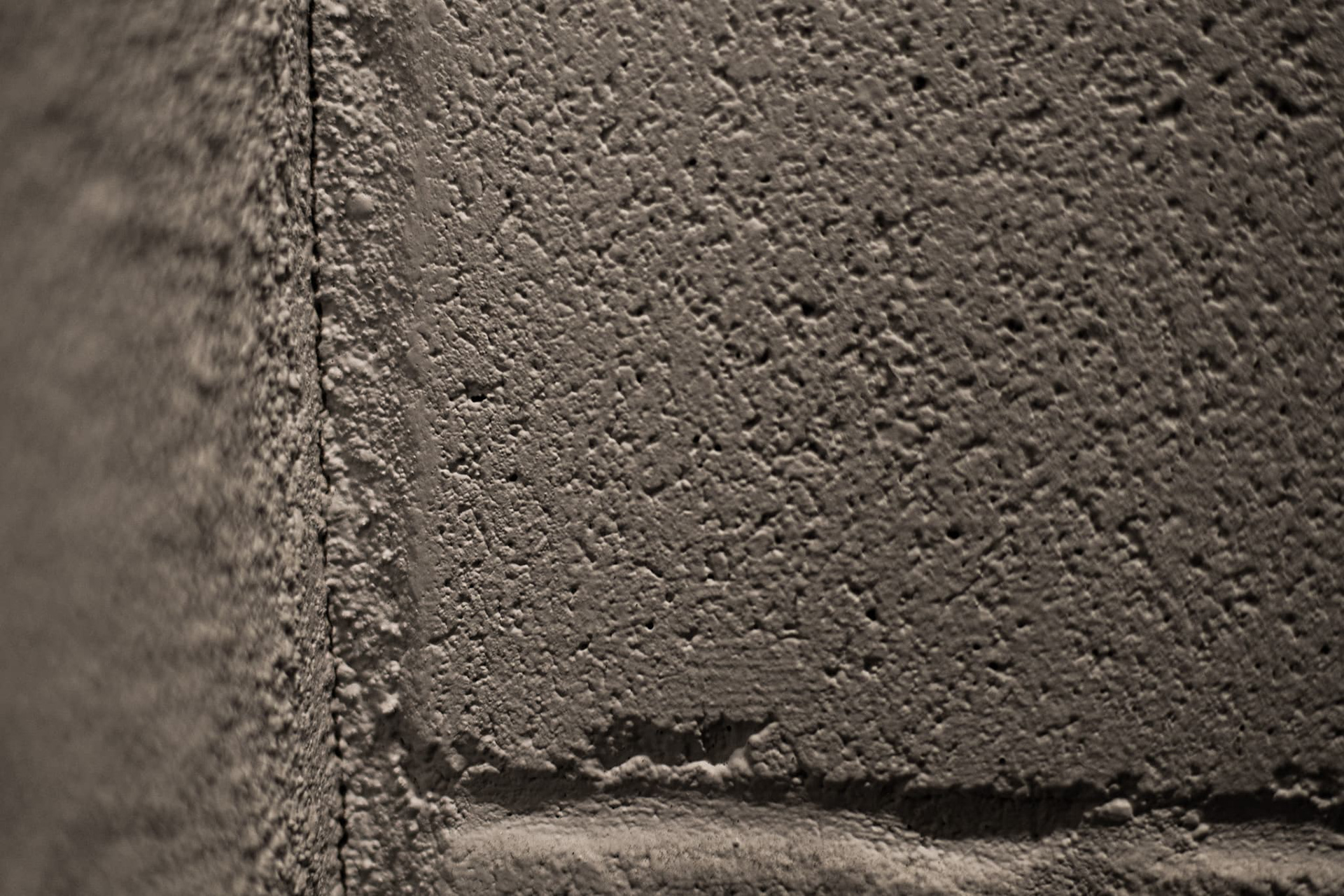 Plain old wall with showing off its neat texture for some cool points.