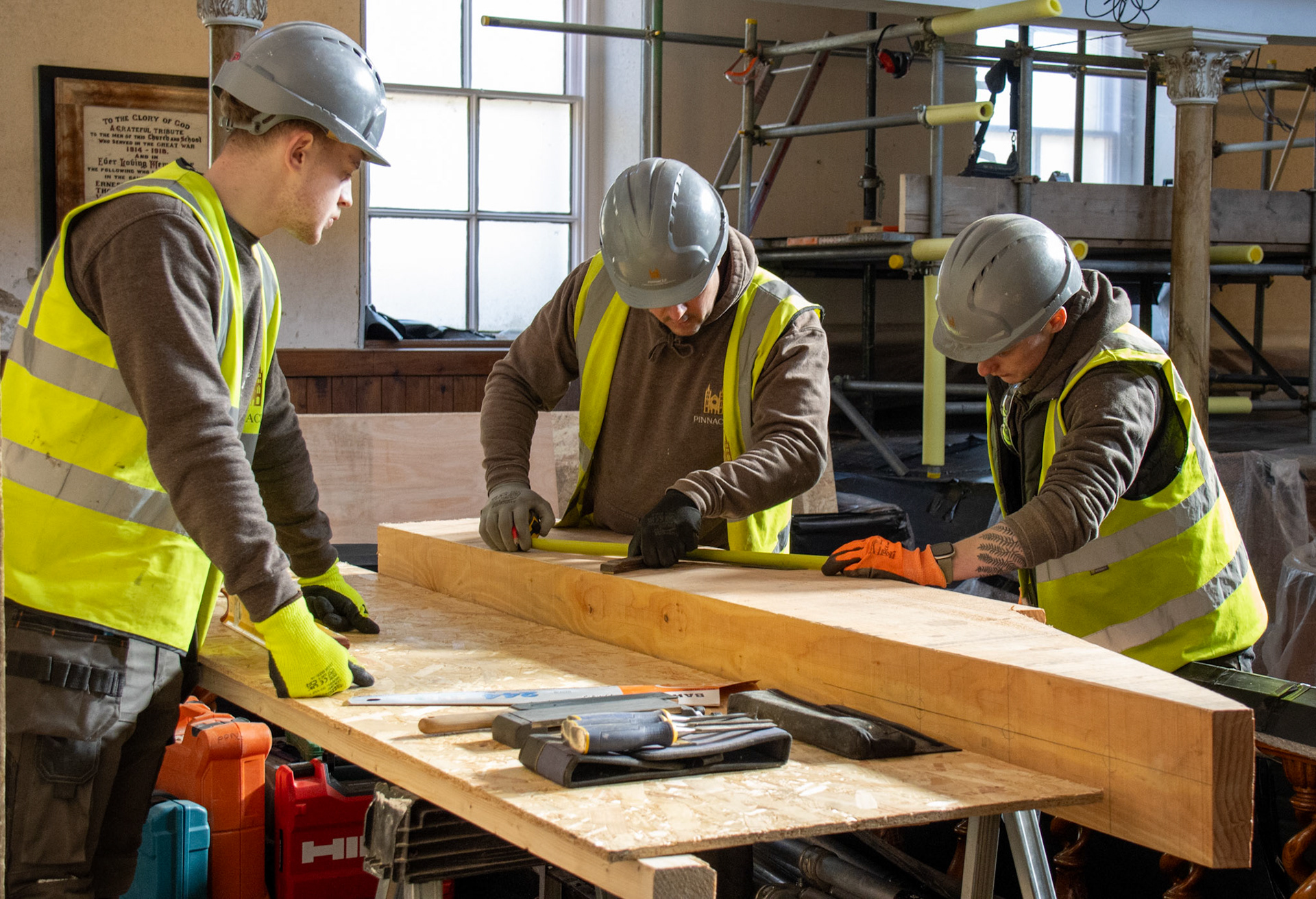 Apprentices working on the restoration