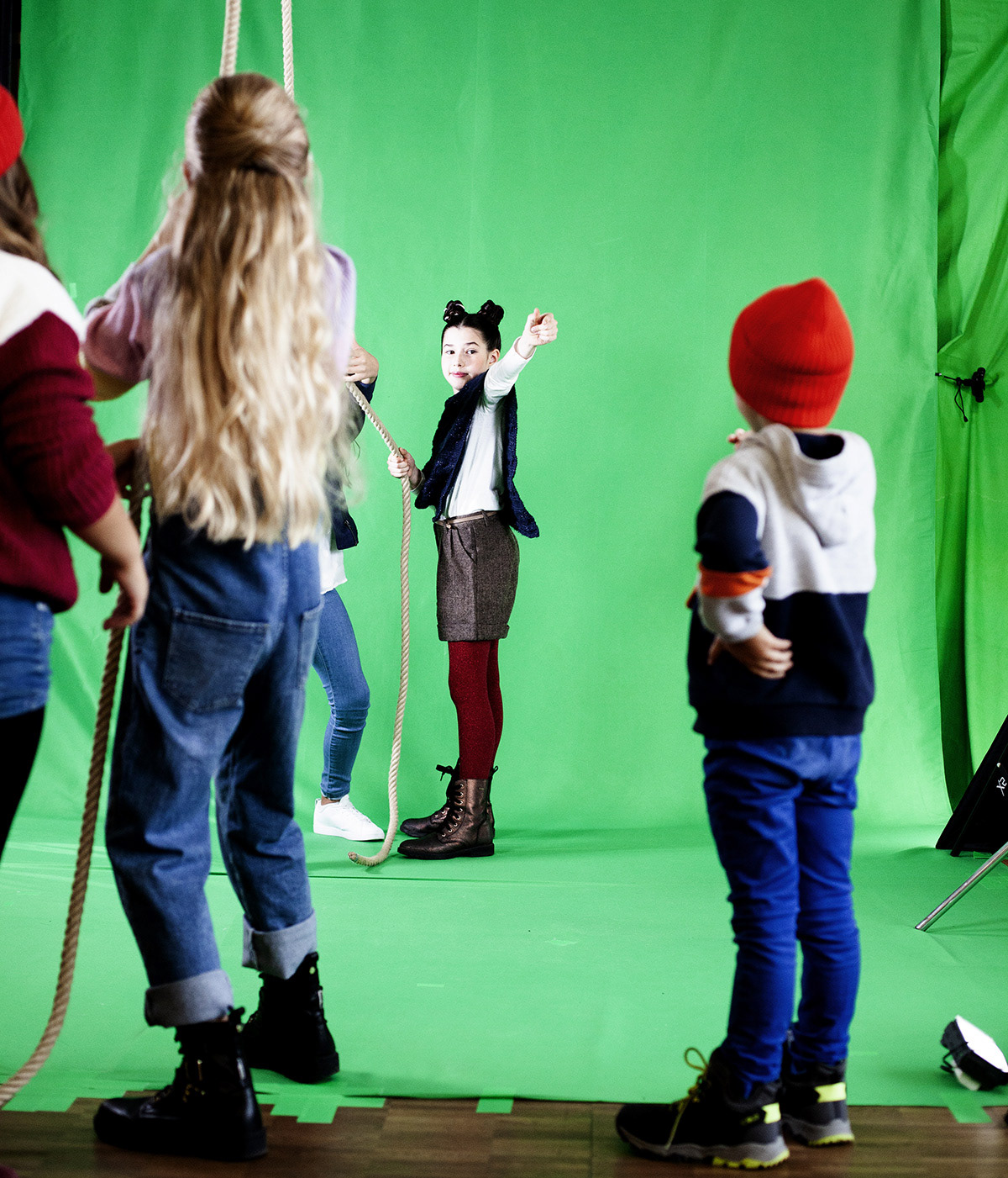 Croma Set with the kids playing with a rope.Emotion Graphics. Cast for TV Xmans IDS. Film Production and video Animation in Munchen. Color Photography by Rob Adalierd. Characters on set. Produced by Aitor Benavent.