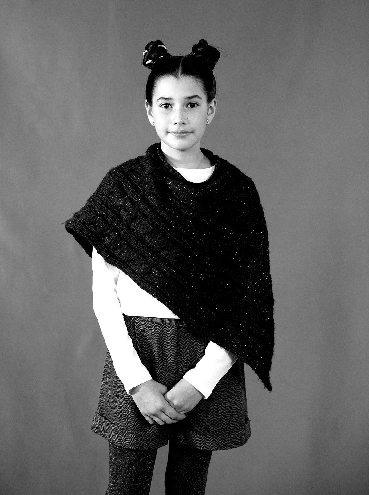 Black and White portrait of a young girl looking straith to the camera..Emotion Graphics. Cast for TV Xmans IDS. Video Production and film Animation Munich. Photography by Rob Adalierd, Produced by Aitor Benavent