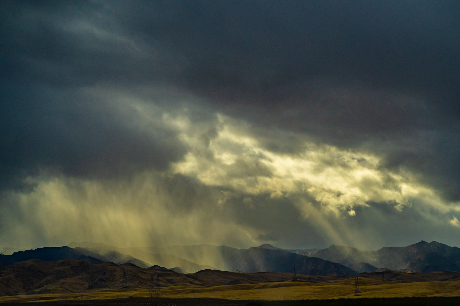 sunlight striking the coastal mountains of the California coastal range 