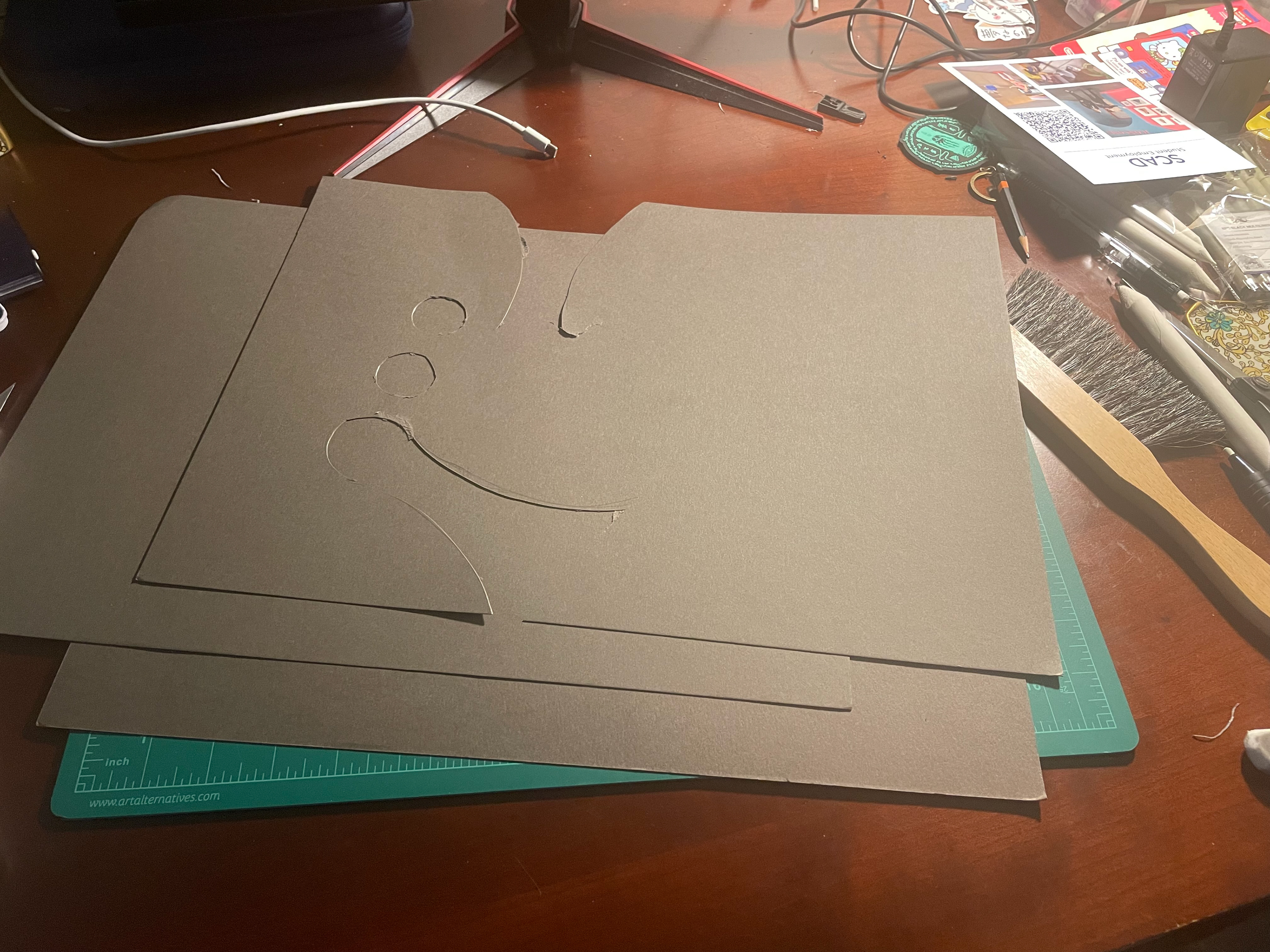 Black Cardstock paper was cut into simple shapes