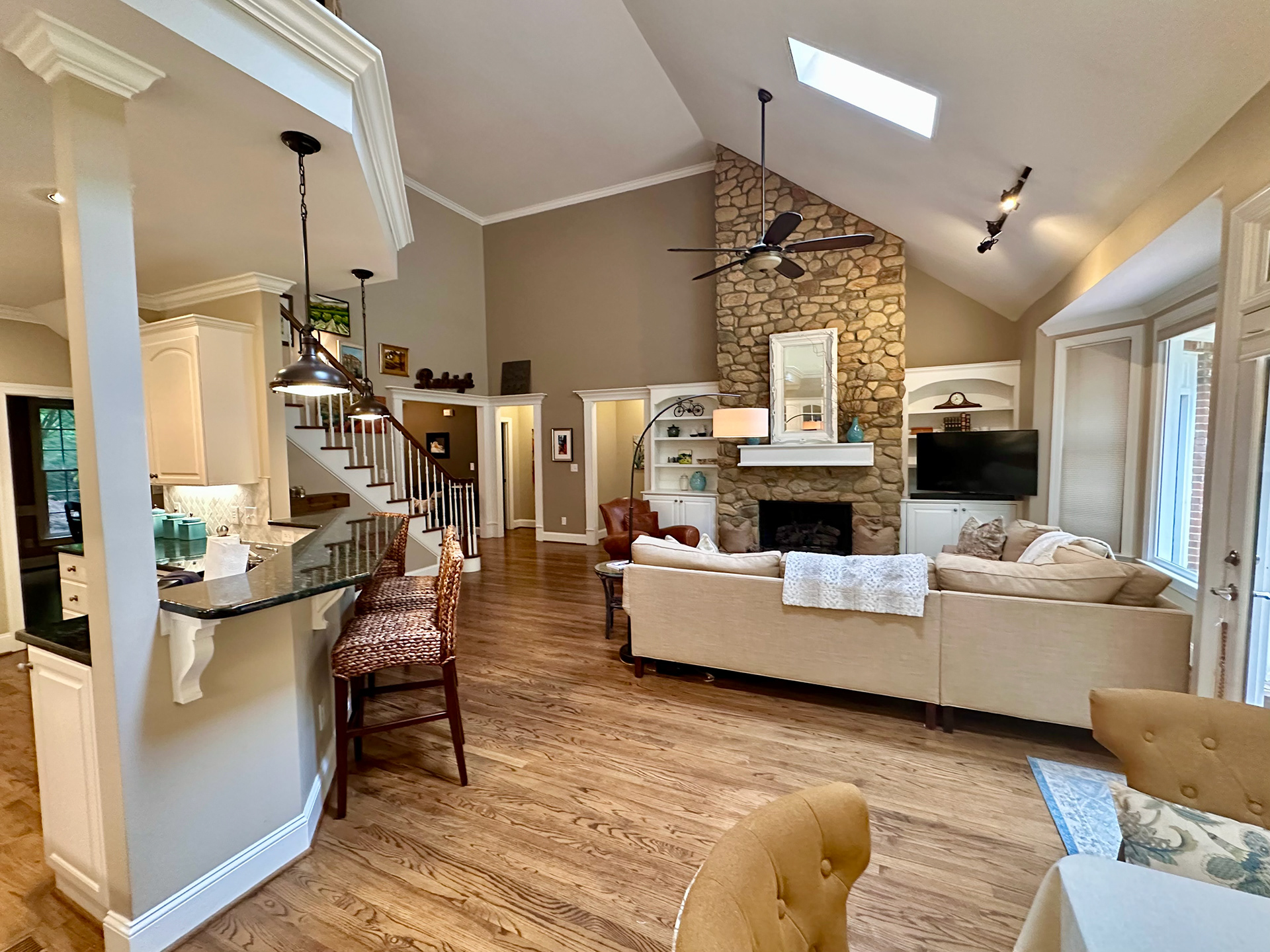 Open concept kitchen, casual dining and family room