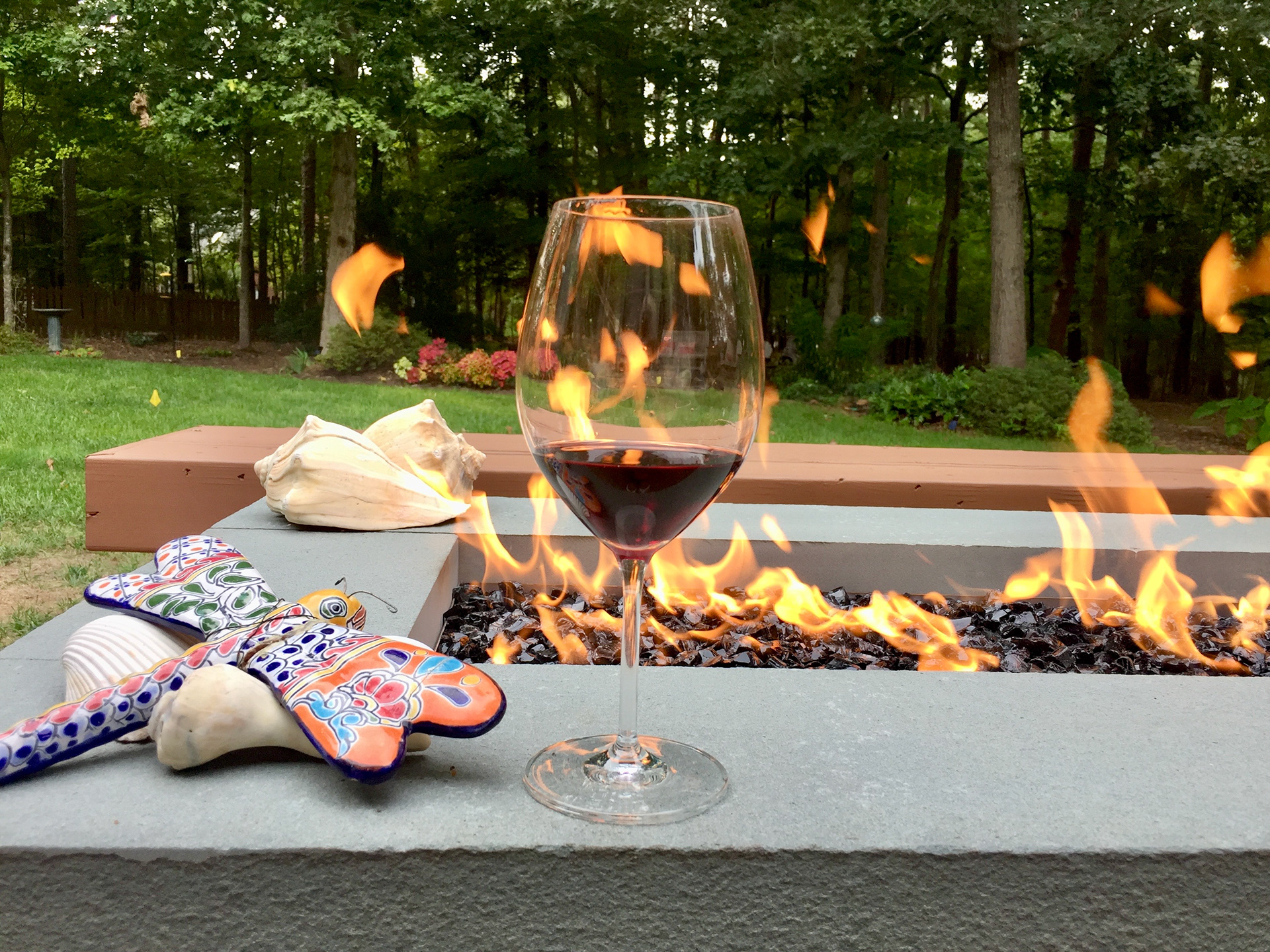 Relax by a built in natural gas fire pit