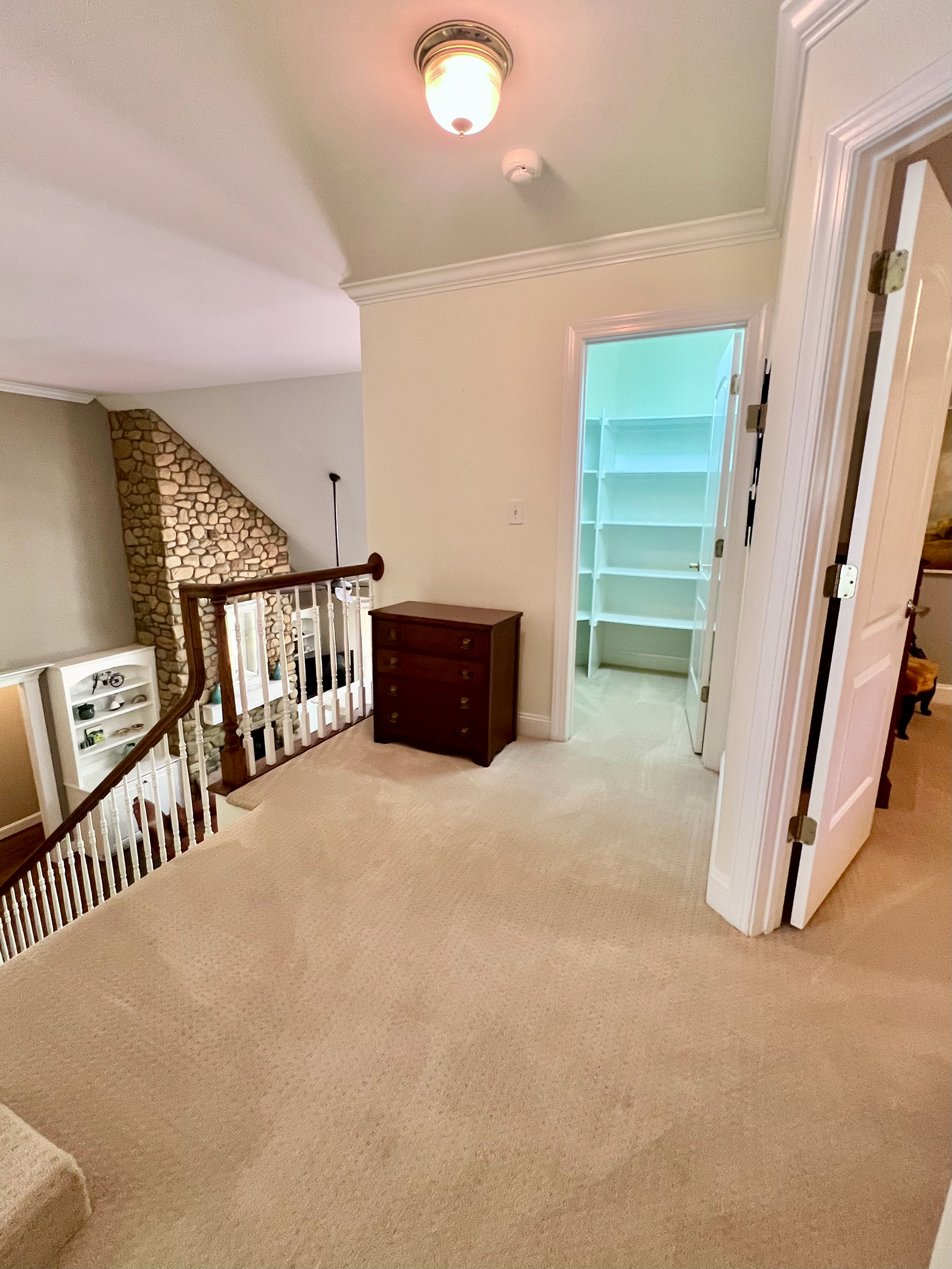 Gallery at top of stairs and linen closet
