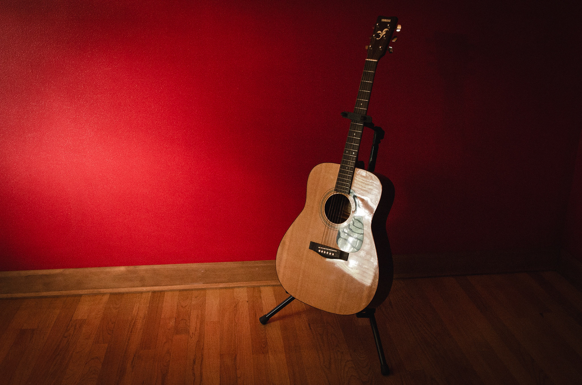 Guitar relection in light from window
