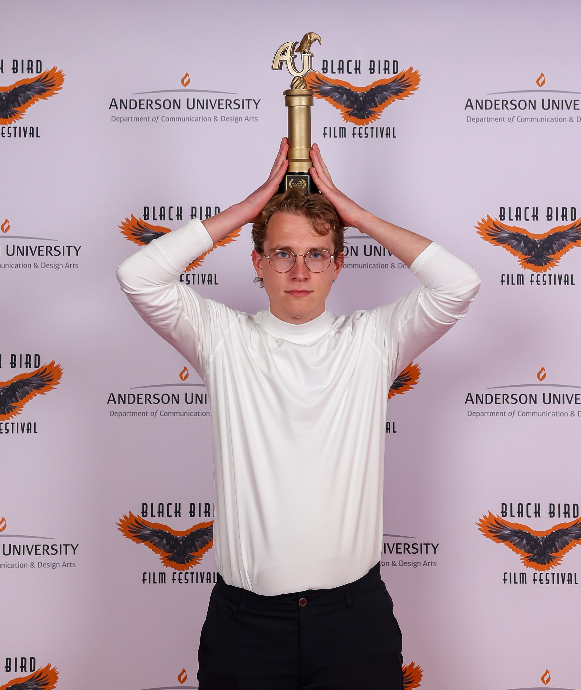 Holding the award for "Best Animation" at the 2024 Black Bird Film Festival