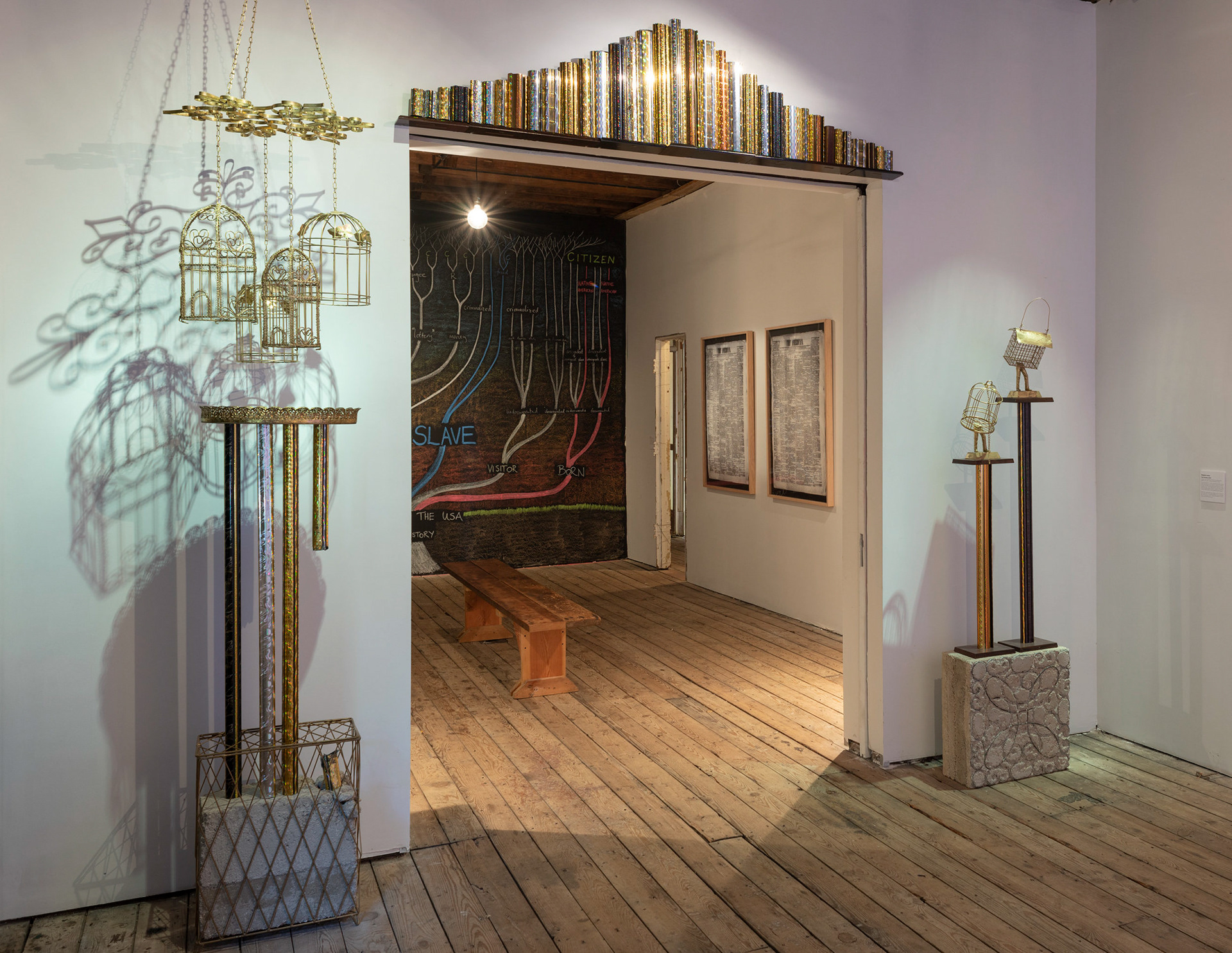 The Promise by Benjamin Larose (foreground), Sunset on the American Dream by Eugenia Cheng (background left) and The American. by Julietta Cheung (background right)