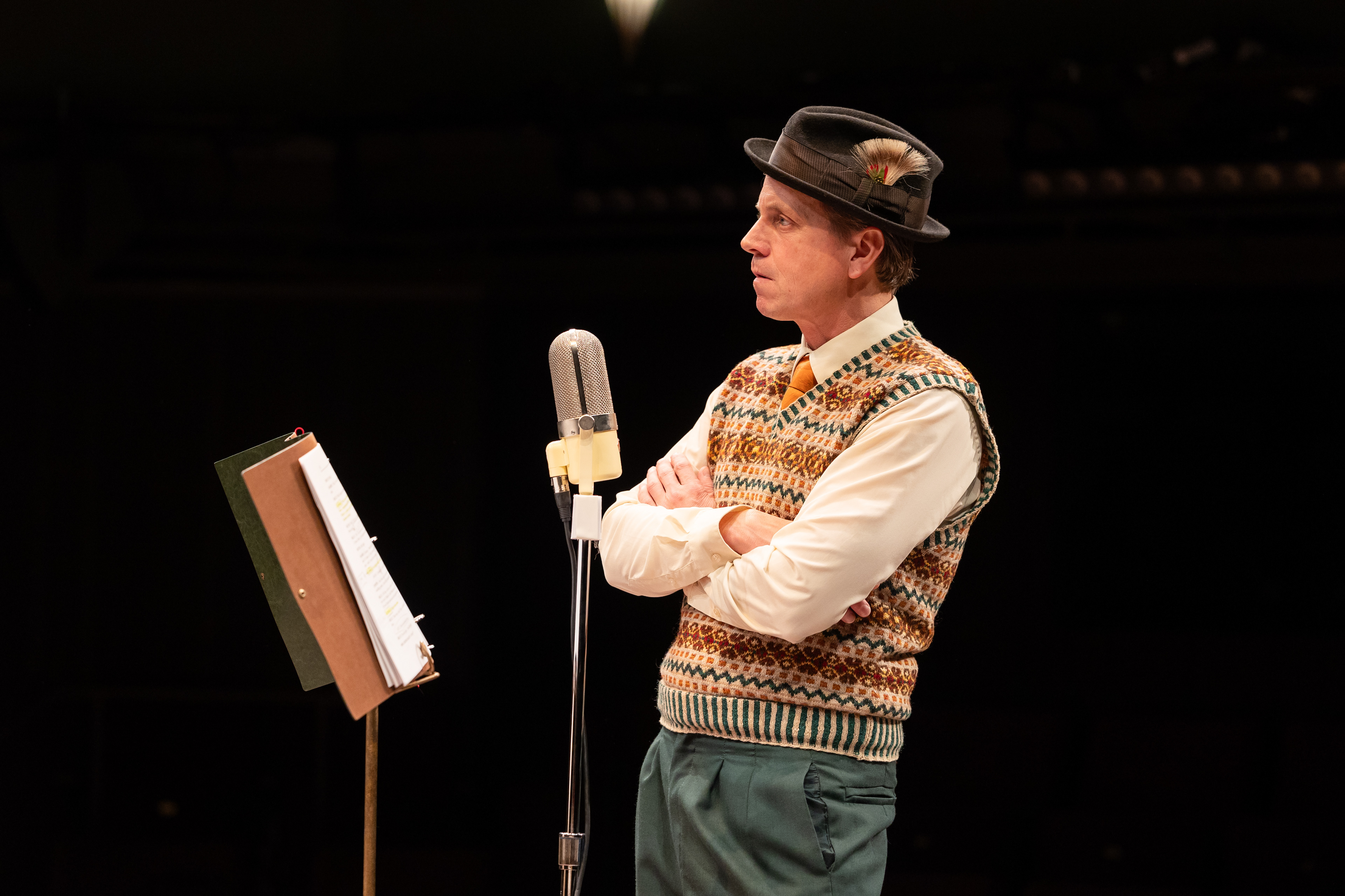 It’s A Wonderful Life: A Live Radio Play   stageshouston.com  WRITTEN BY: JOE LANDRY DIRECTED BY: DEREK CHARLES LIVINGSTON BASED ON THE STORY "THE GREATEST GIFT" BY PHILIP VAN DOREN STERN PRODUCERS: AMY SUTTON AND GARY CHILES  Photo courtesy of Stages Pictured: Cast of It's a Wonderful Life: A Live Radio Play, Stages (2025). Photo by: Melissa Taylor  CREATIVE TEAM Stage Manger: Carlos Cantu Scenic & Properties Designer: Jodi Bobrovsky Lighting Designer: Bryan Ealey Costume Designer: Leah Smith Sound Designer: Robert Leslie Meek Wig Stylist: Gisell Rubio  CAST VIOLET, et al: DeShae LaShawn Mary, et al: Jillian Linton Potter, et al: Gabriel Regojo George Bailey: Ryan Schabach Joseph, et al: Christopher Szeto-Joe  Clarence, et al: Pamela Vogel