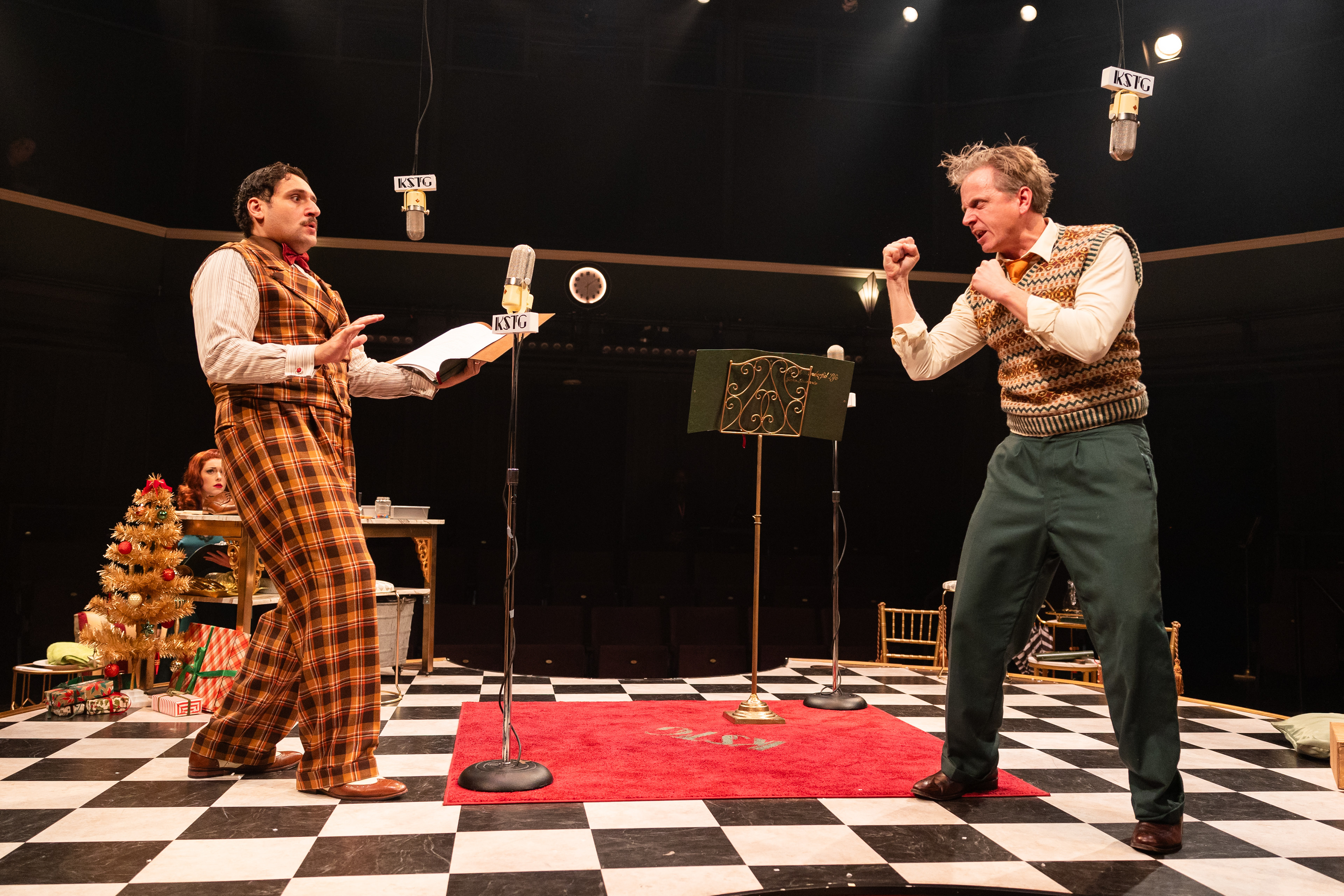 It’s A Wonderful Life: A Live Radio Play   stageshouston.com  WRITTEN BY: JOE LANDRY DIRECTED BY: DEREK CHARLES LIVINGSTON BASED ON THE STORY "THE GREATEST GIFT" BY PHILIP VAN DOREN STERN PRODUCERS: AMY SUTTON AND GARY CHILES  Photo courtesy of Stages Pictured: Cast of It's a Wonderful Life: A Live Radio Play, Stages (2025). Photo by: Melissa Taylor  CREATIVE TEAM Stage Manger: Carlos Cantu Scenic & Properties Designer: Jodi Bobrovsky Lighting Designer: Bryan Ealey Costume Designer: Leah Smith Sound Designer: Robert Leslie Meek Wig Stylist: Gisell Rubio  CAST VIOLET, et al: DeShae LaShawn Mary, et al: Jillian Linton Potter, et al: Gabriel Regojo George Bailey: Ryan Schabach Joseph, et al: Christopher Szeto-Joe  Clarence, et al: Pamela Vogel