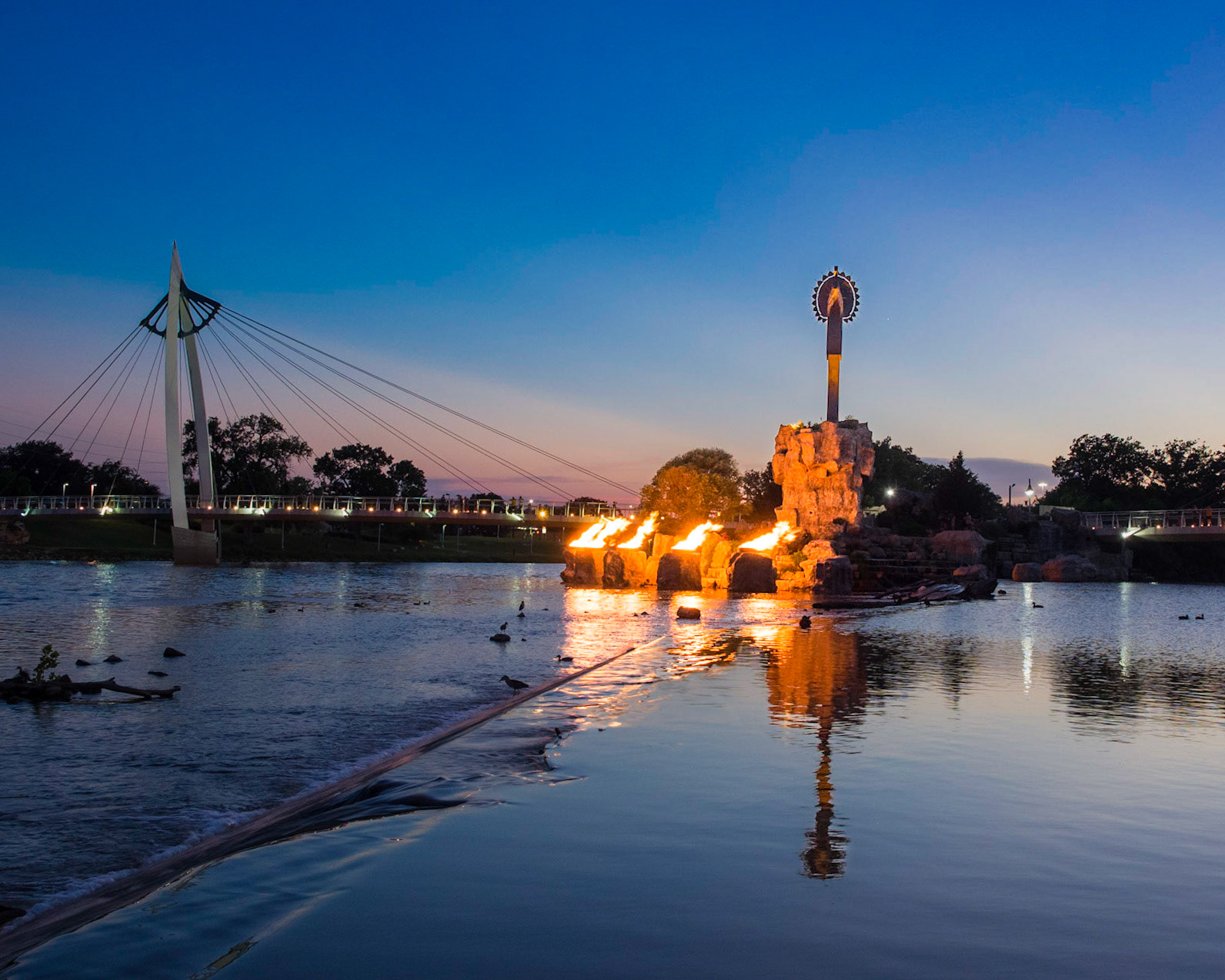 Except during inclement weather, a nightly spectacle at the Keeper of the Plains is the lighting of firepots surrounding the base of the sculpture.