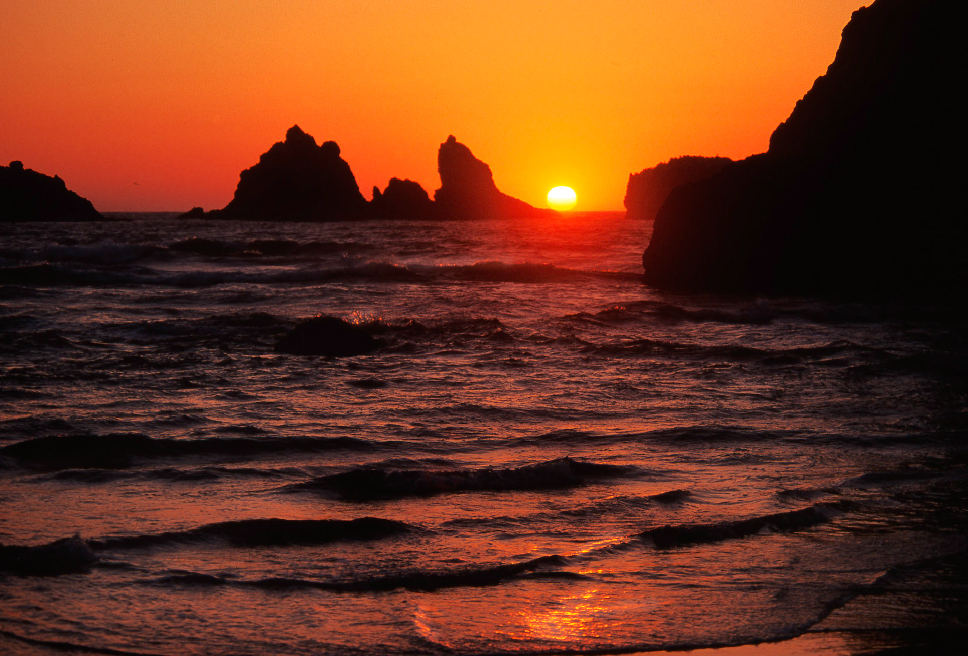 "Sunset Over the Cat and Kittens Rocks", Bandon, Oregon, 2002