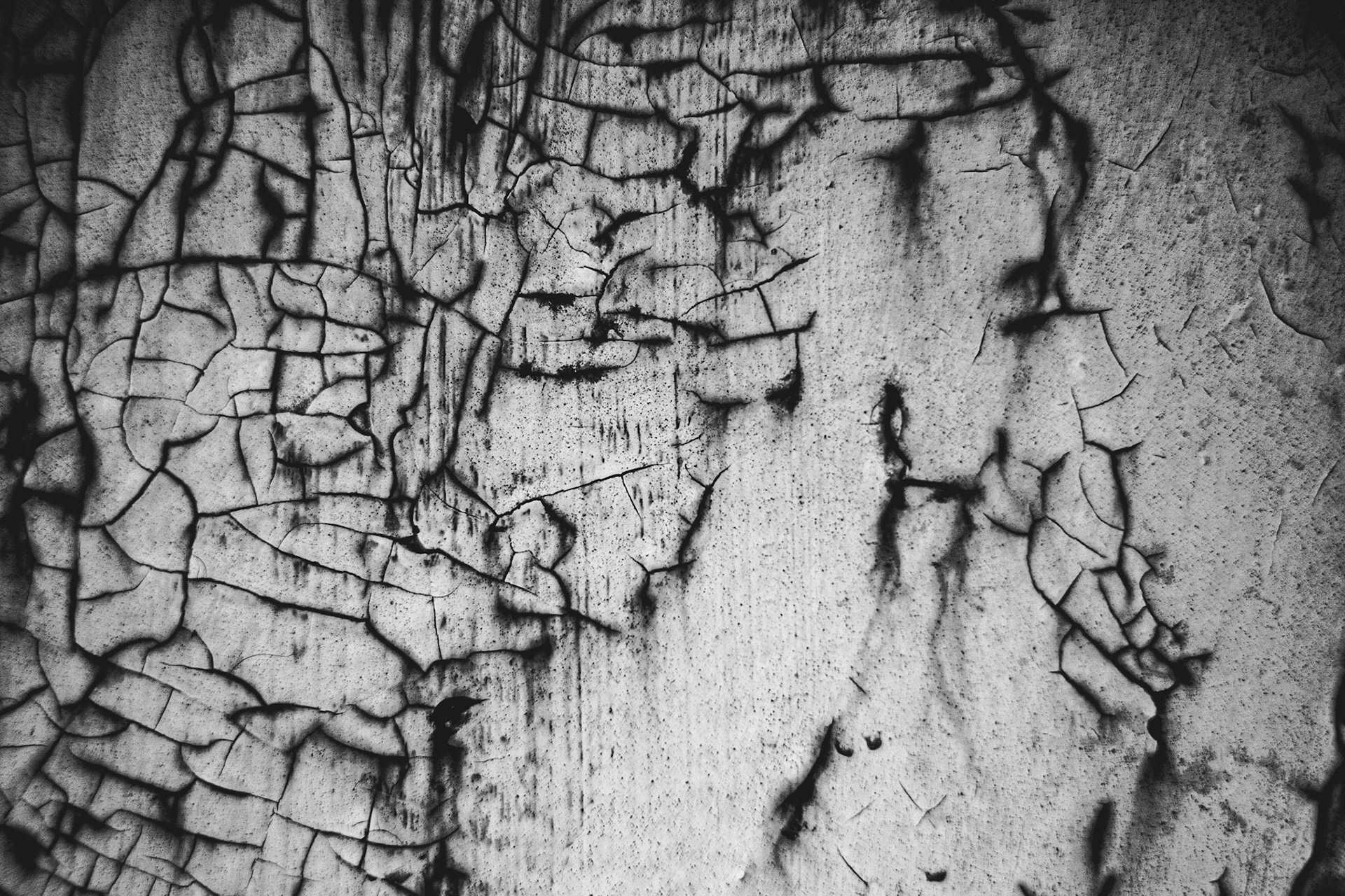 Paint peeling and cracking.