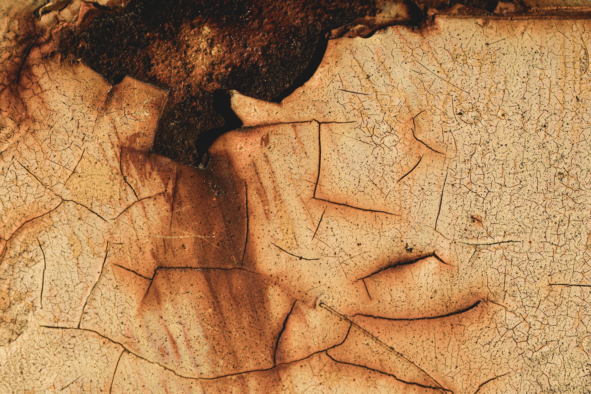 Rust dripping down chipping paint.