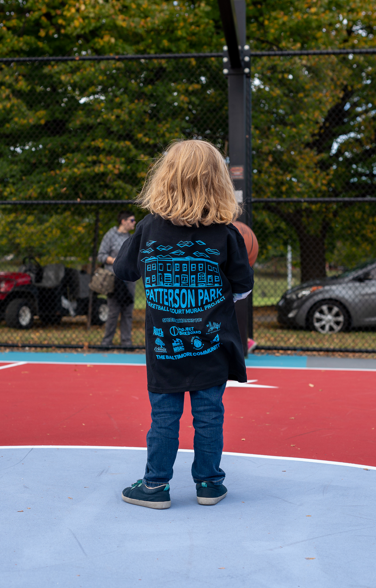 Youth in commemorative t-shirt