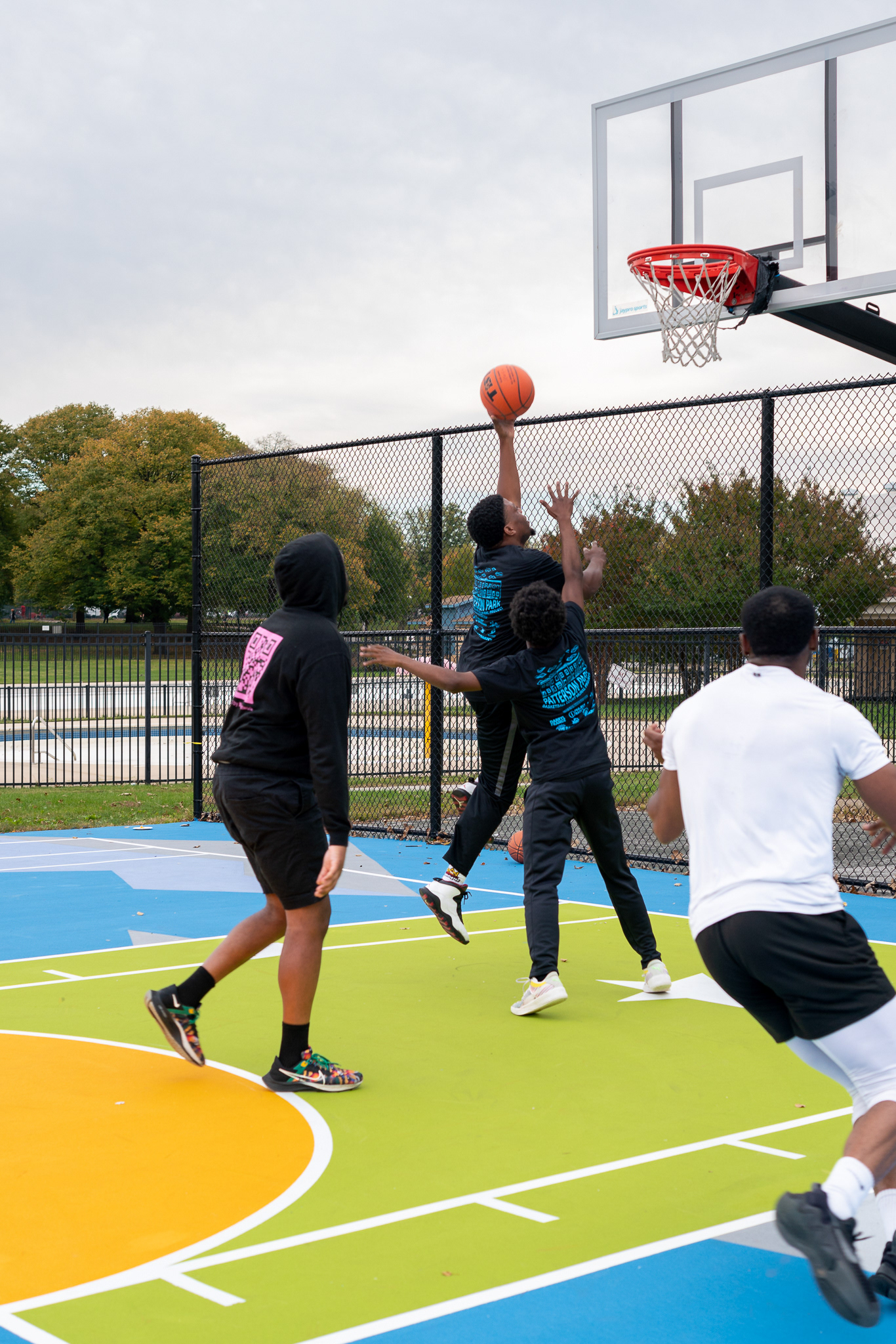 Playing basketball on painted courts