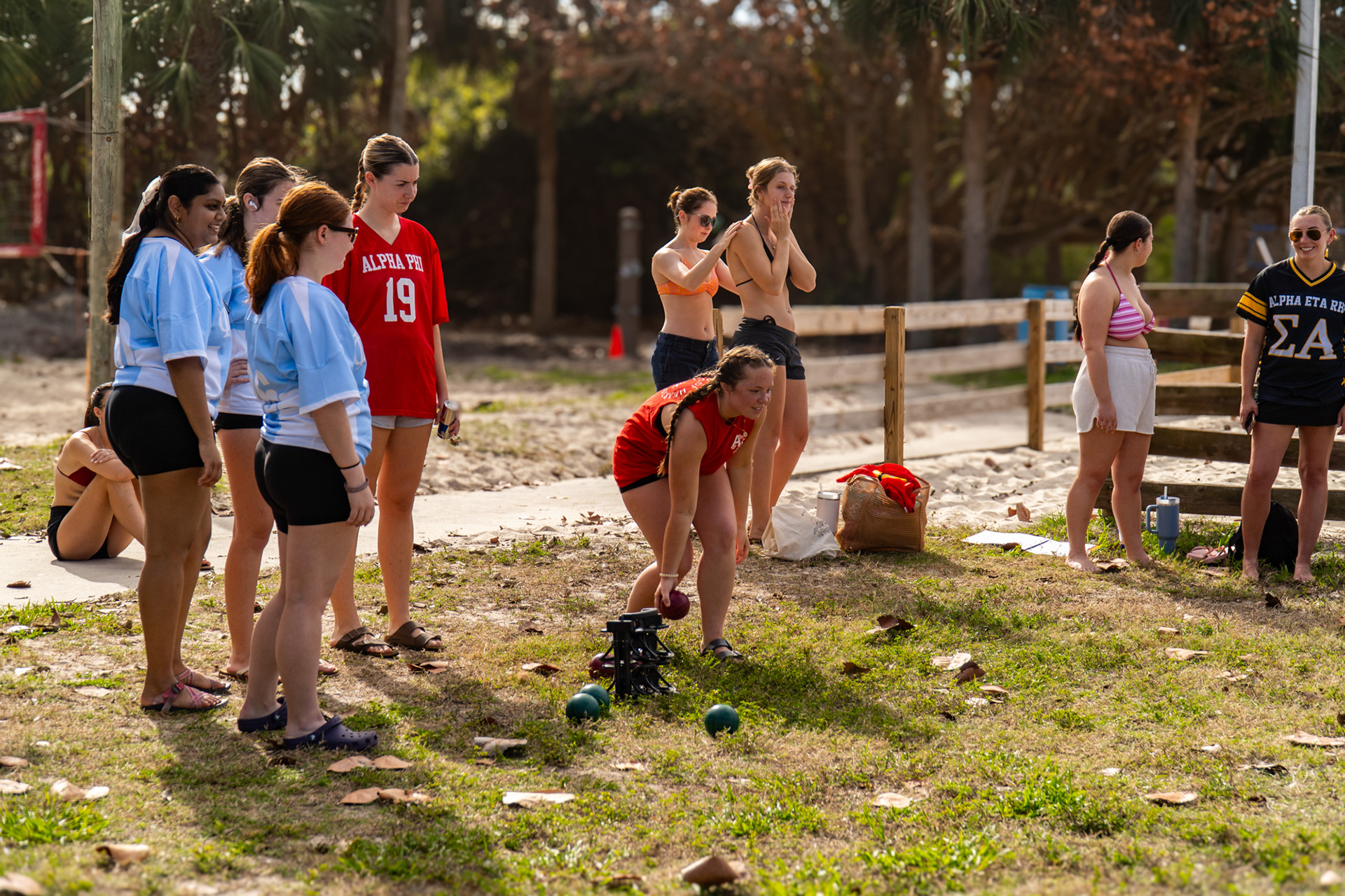 Alpha Phi plays Phi Sigma Sigma in the first round of bocce ball.