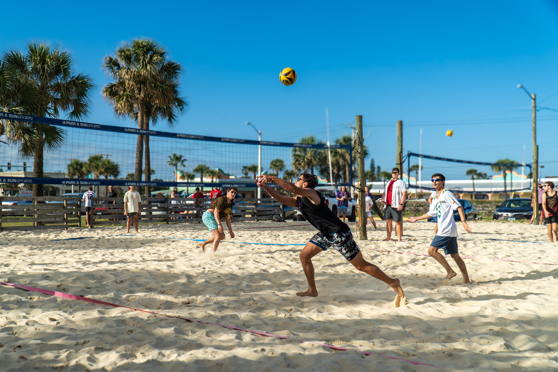 Lambda Chi Alpha plays Alpha Eta Rho in the play-in round of beach volleyball.