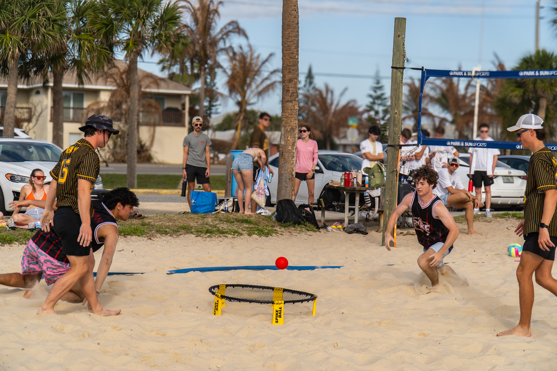 Pi Kappa Alpha plays Men’s Alpha Eta Rho during practice for spikeball.