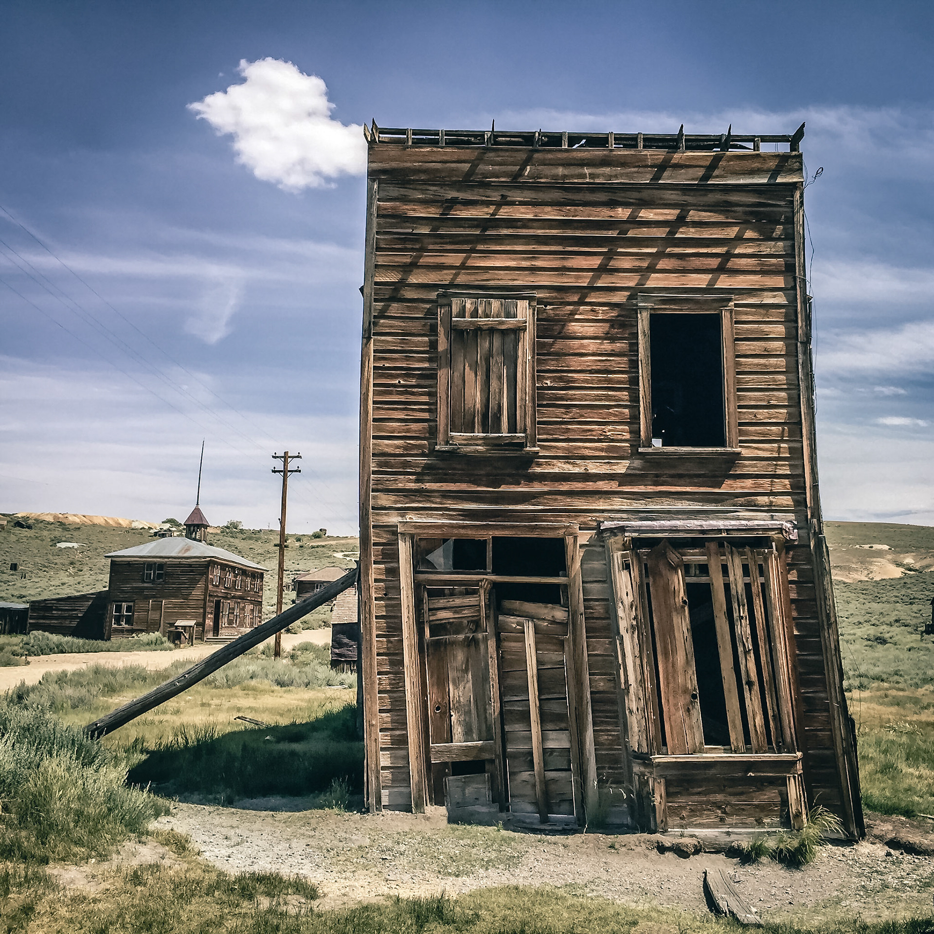 Bodie is a fascinating ghost town in California. It has been preserved in arrested decay since the 1940s. Allegedly, this was a former hotel