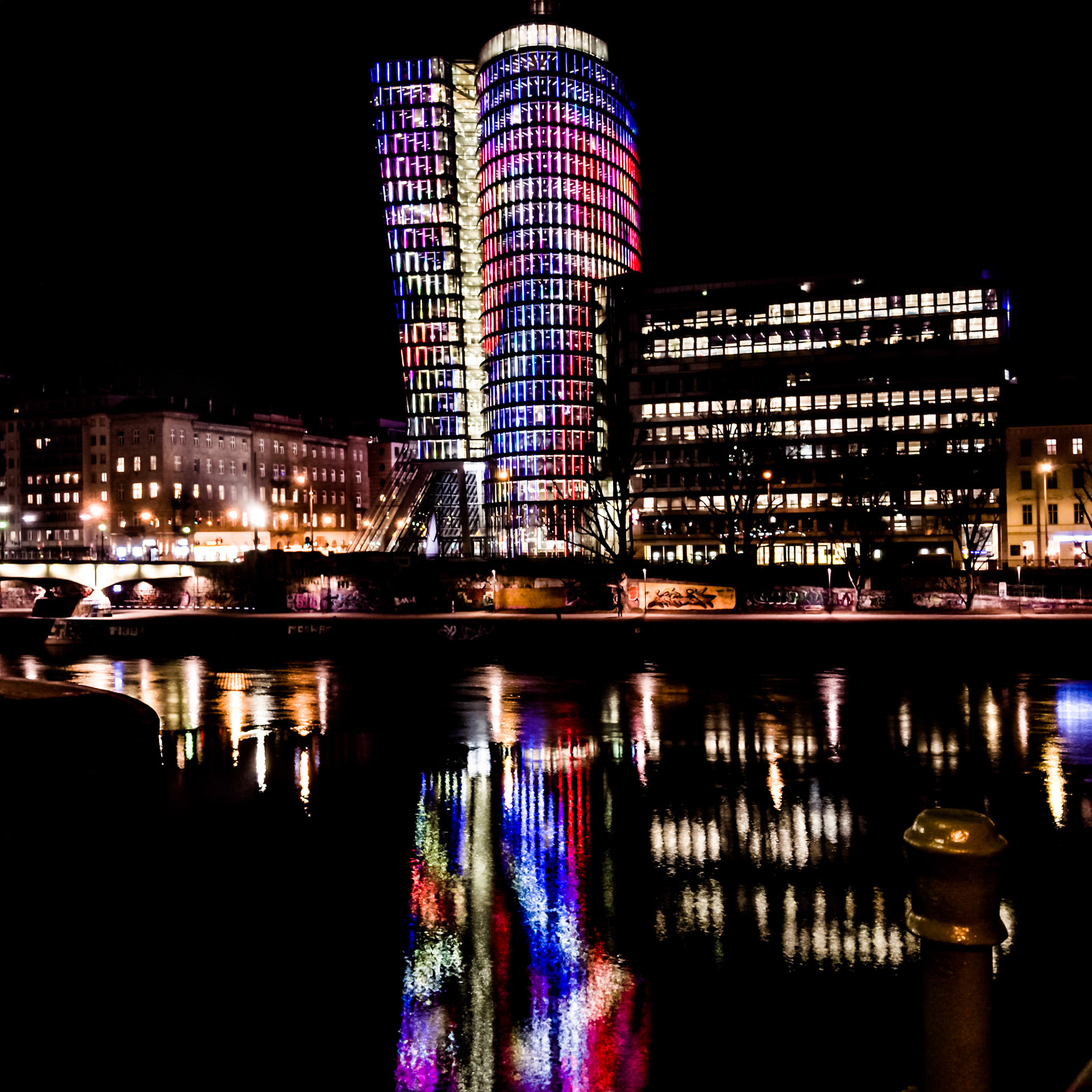 A long exposure of an illuminated office building in Vienna.