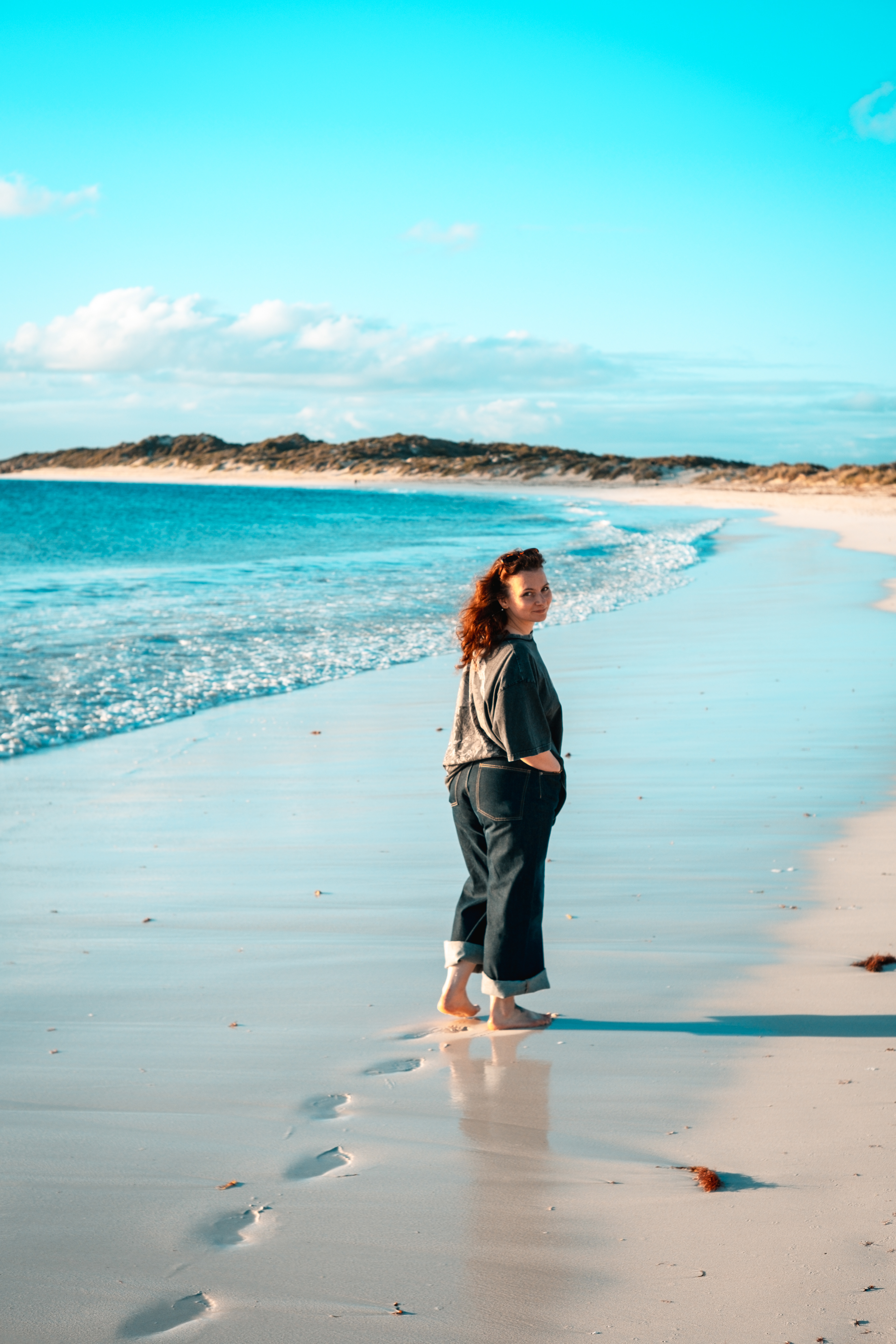Walking barefoot on Lancelin beach, candid portrait by Focus by Armand.