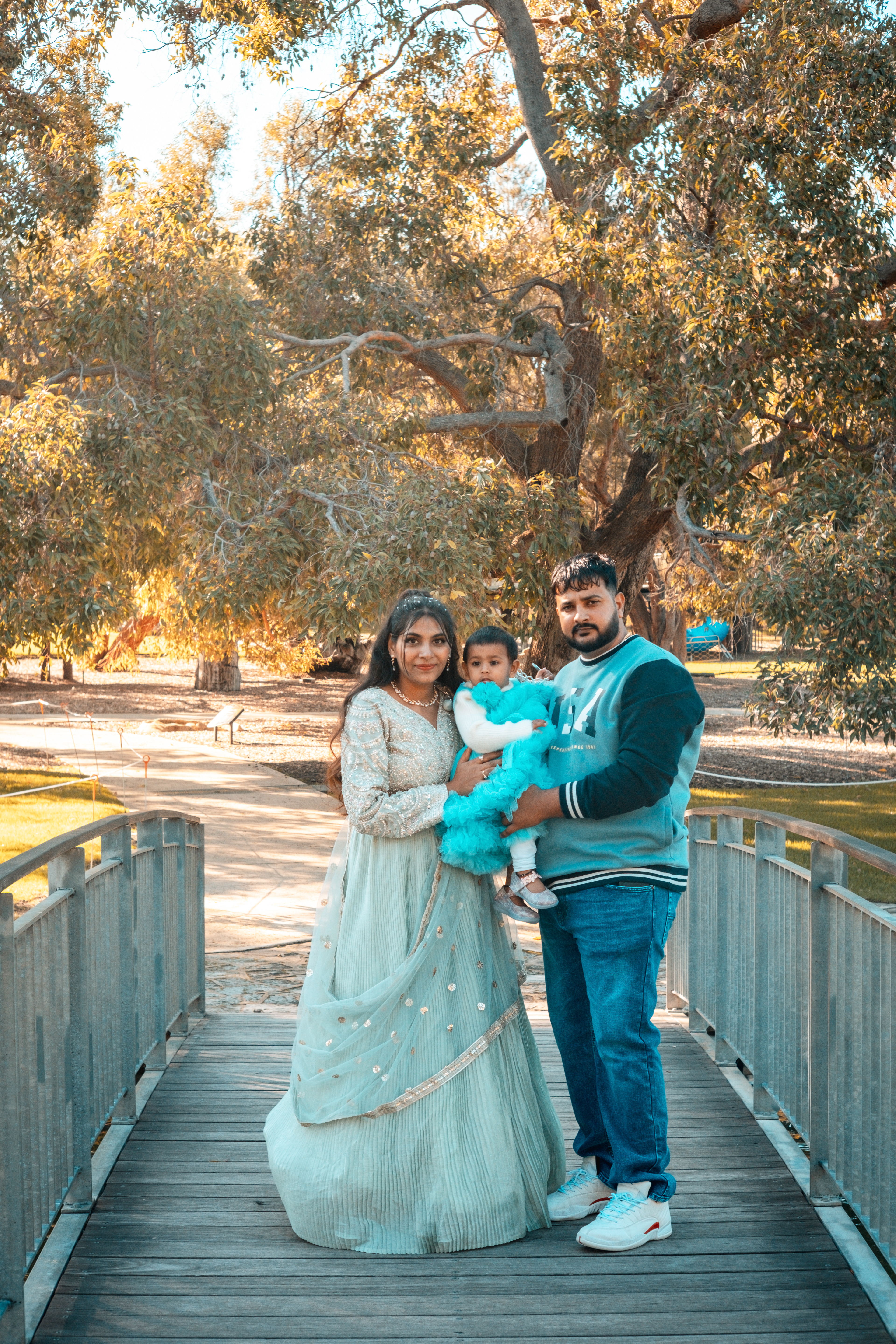 Candid family moment on the bridge at Kings Park birthday photoshoot.