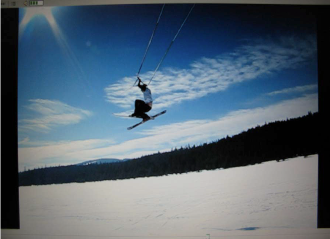 Test rider Ben Noble, also a near pro snow skier, busting a big air behind the snowmobile. What a crazy application!