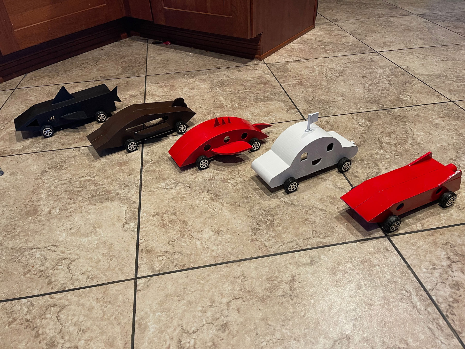 The five cars designed by the kids: (L to R) Shark, Cookie, Bug, Ghost, and Saturn.