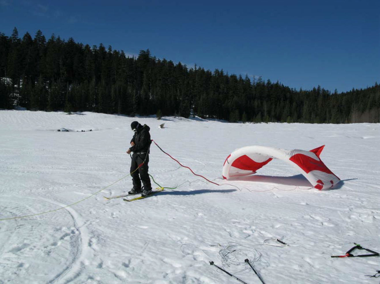Yep, we tried the WakeKite behind a snowmobile on a frozen lake on Mt. Hood. Nuts! Test rider Kedzie Gunderson was the first to try the WakeKite behind the snowmoble. A near expert snow skier, she was a natural choice.