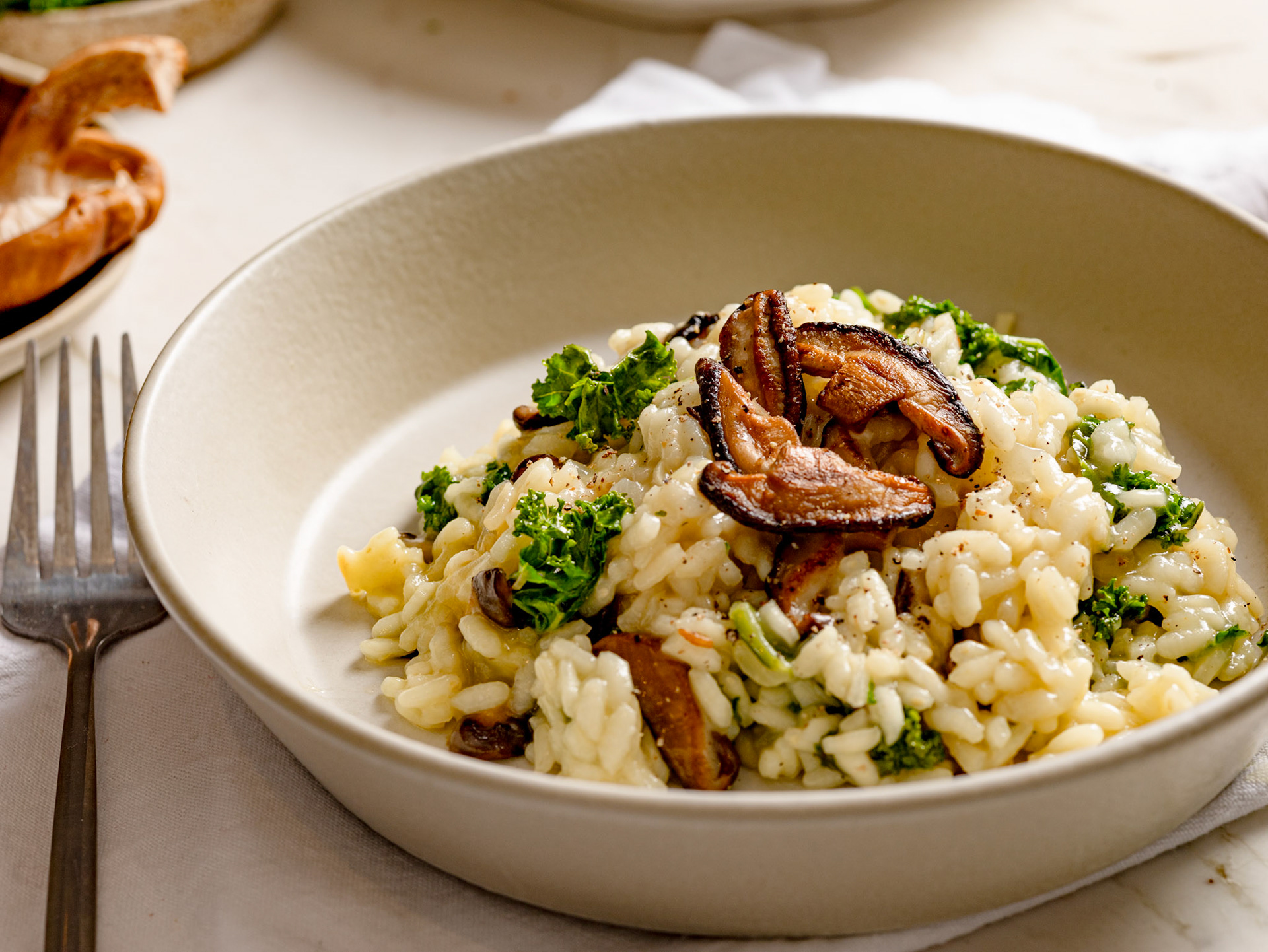 https://www.receiteria.com.br/receita/risoto-de-cogumelos-e-kale/