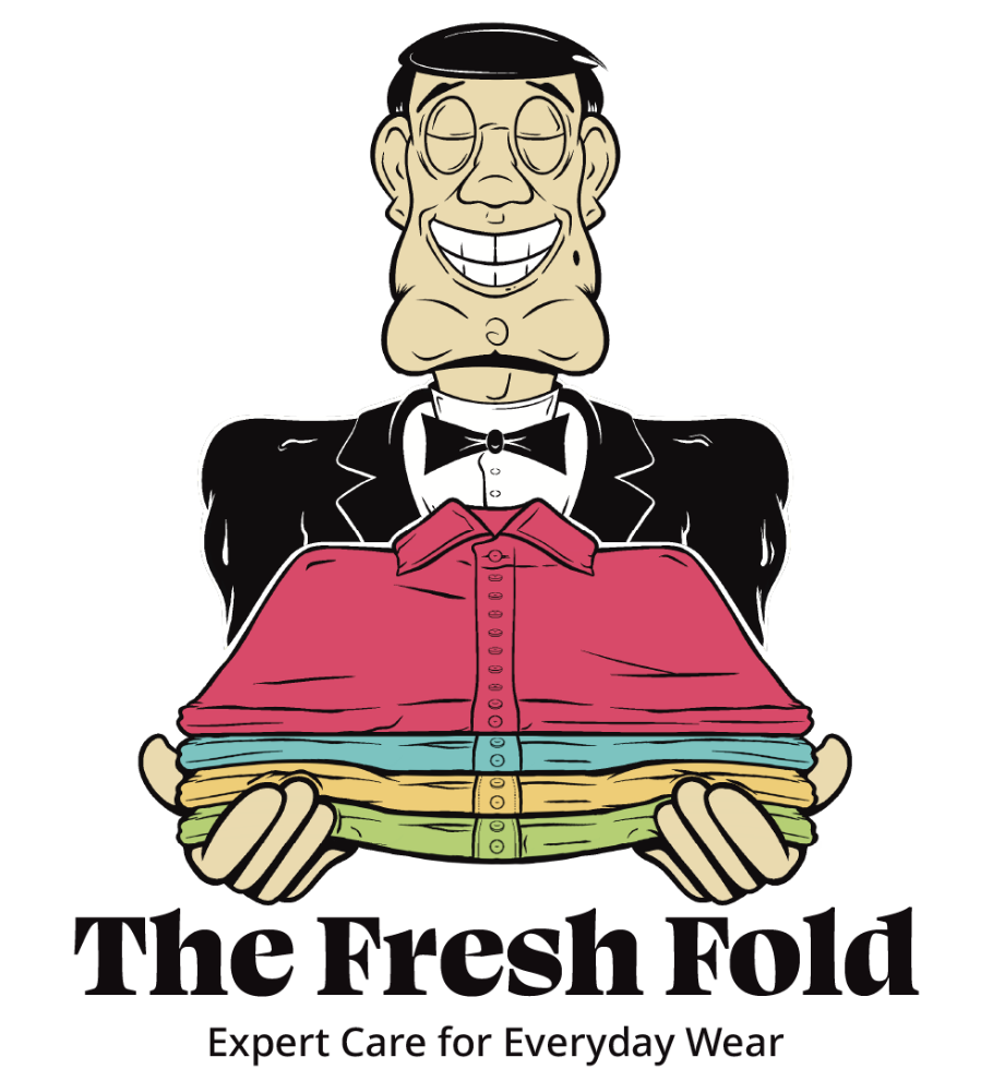 A vibrant, sophisticated mascot illustration of a smiling man in a tuxedo holding a pair of shirts for The Fresh Fold Dry Cleaners logo.