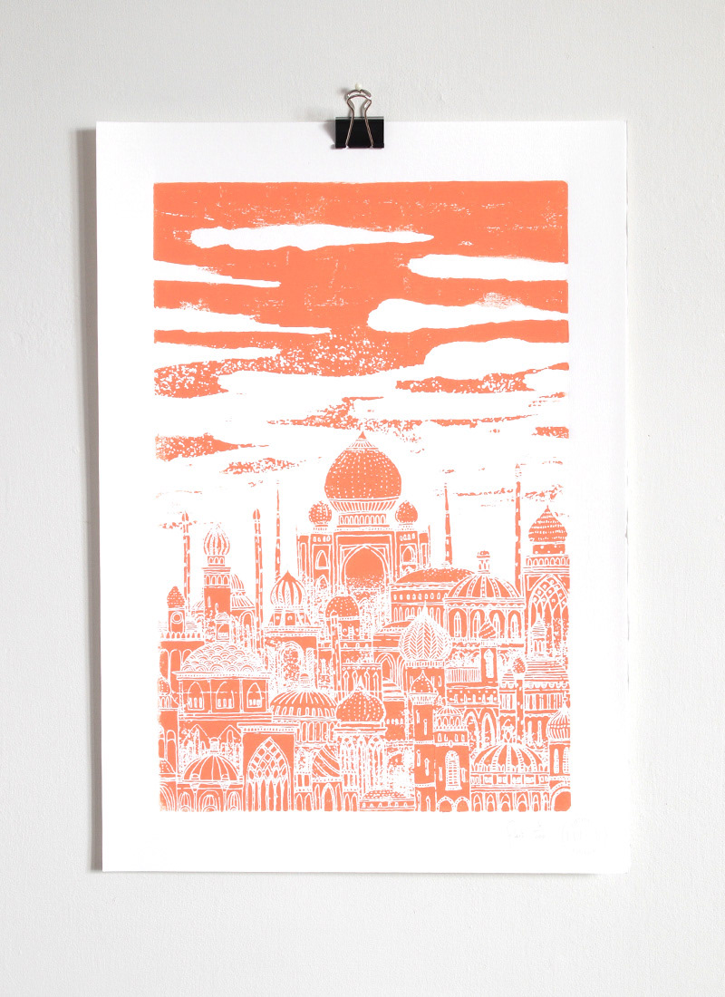 Brightly coloured wooden block print of an imaginary city, inspired by the mythology of the planet Venus