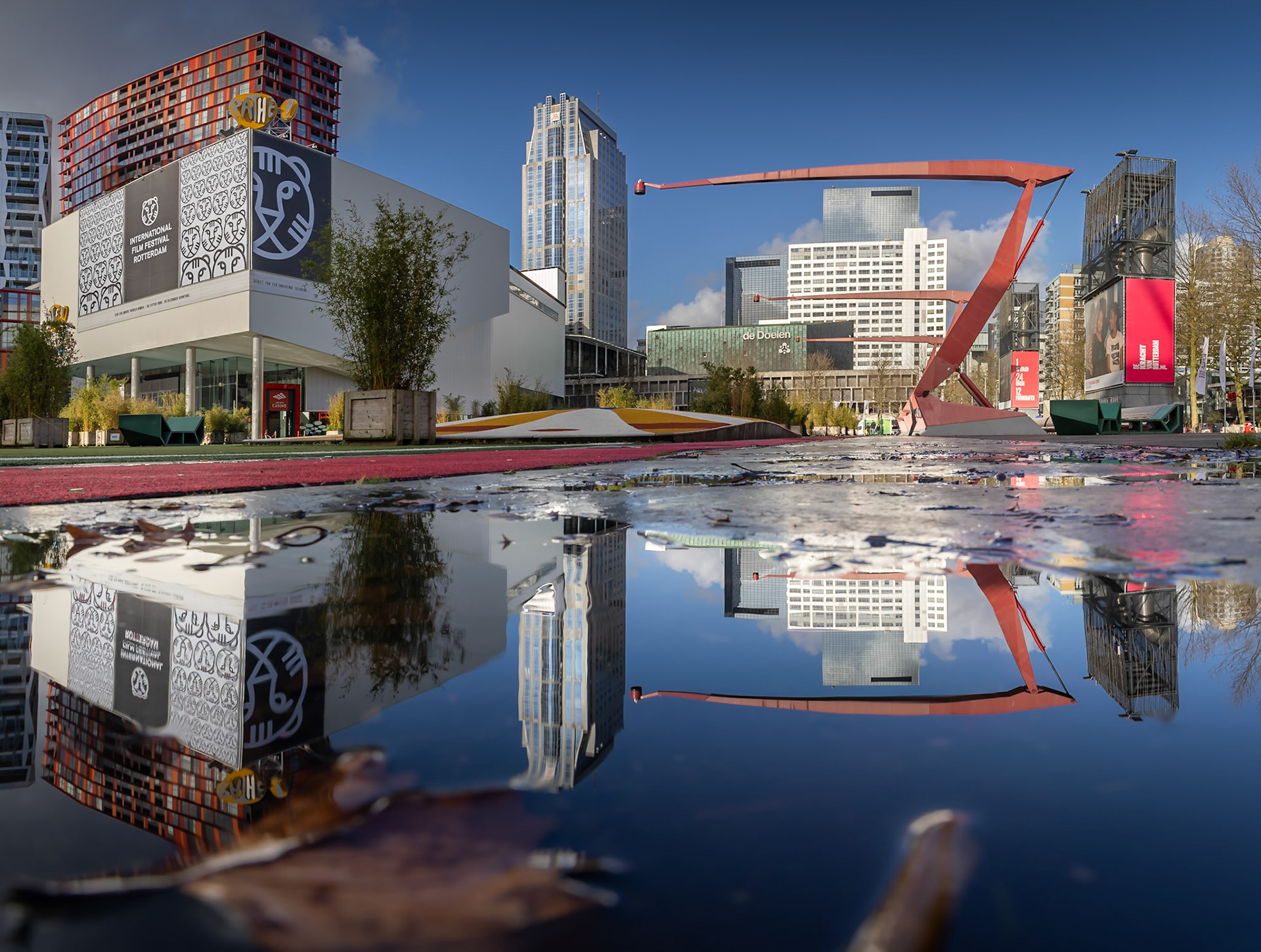 Rotterdam, the Netherlands - January 18 2020: Downtown Rotterdam at Schouwburgplein, a central square surrounded by theathers and restaurants.