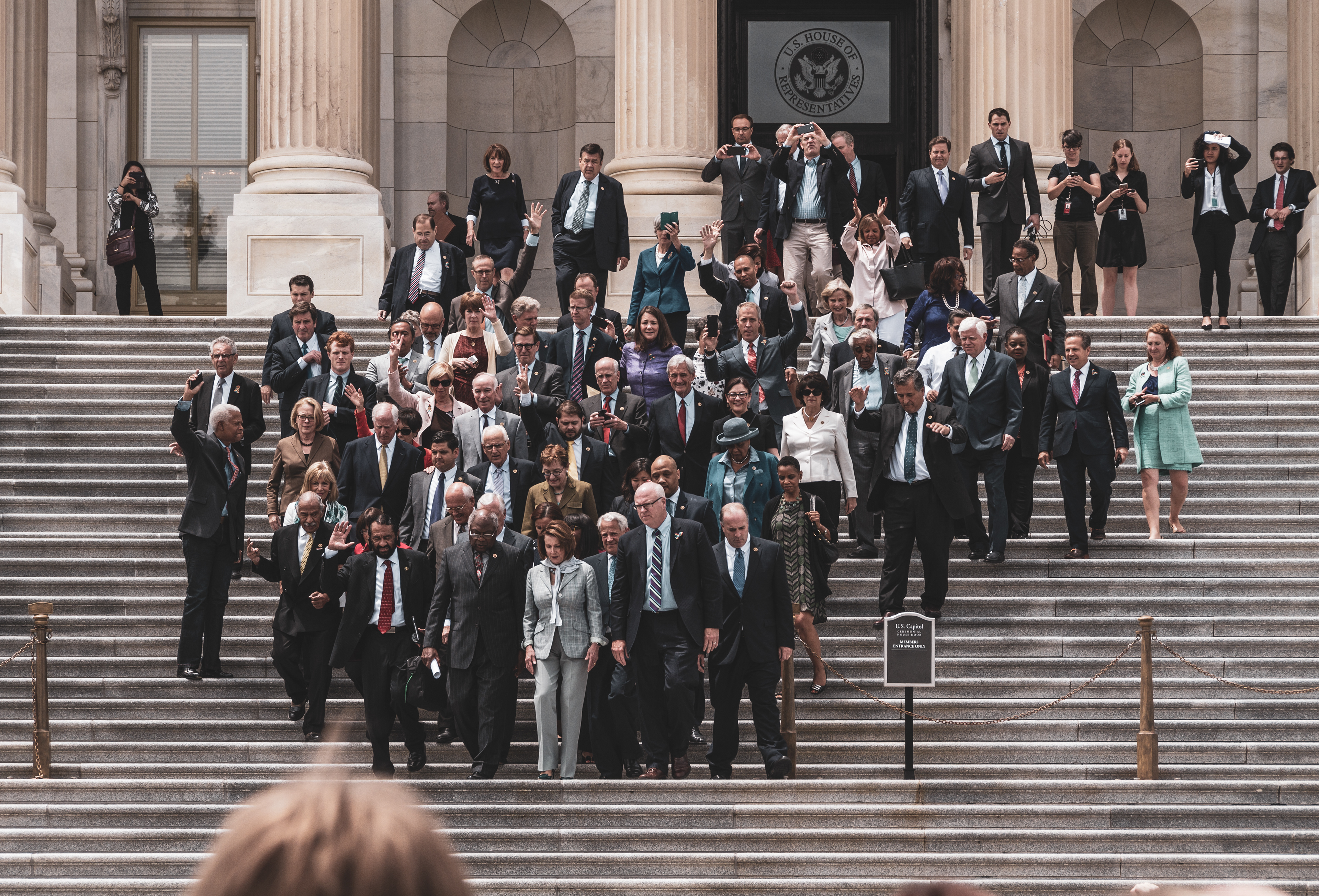 Democratic representatives leave the Capitol after a 26-hour sit-in in the House of Representatives chamber. Led by civil rights icon John Lewis, the group protested the Republican-controlled House's inaction over gun-control legislation.