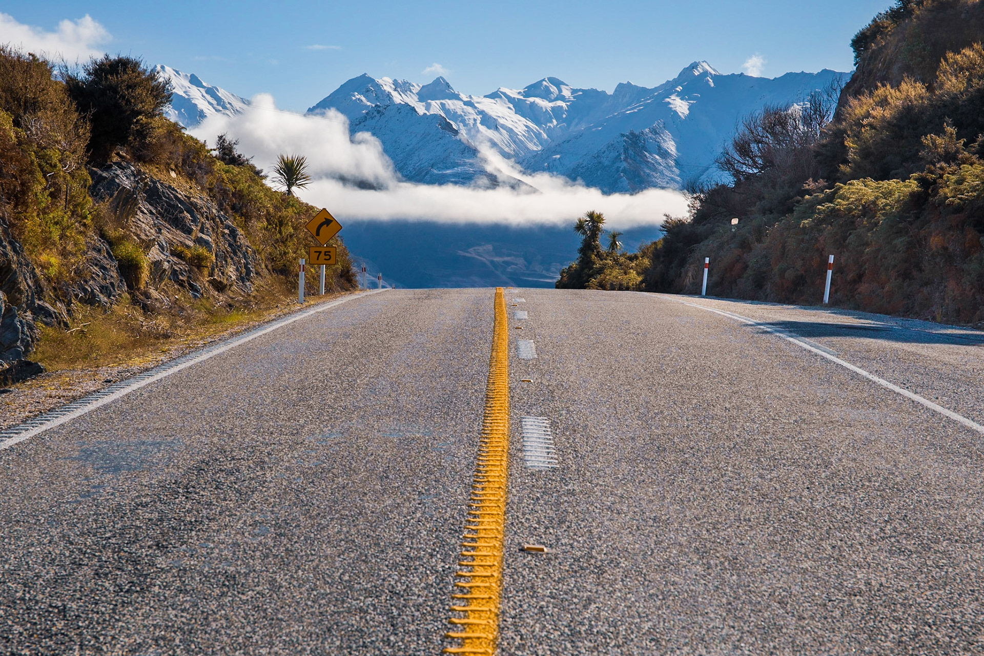 Snow-capped peaks through the Neck, Lake Wanaka, South Island, New Zealand
