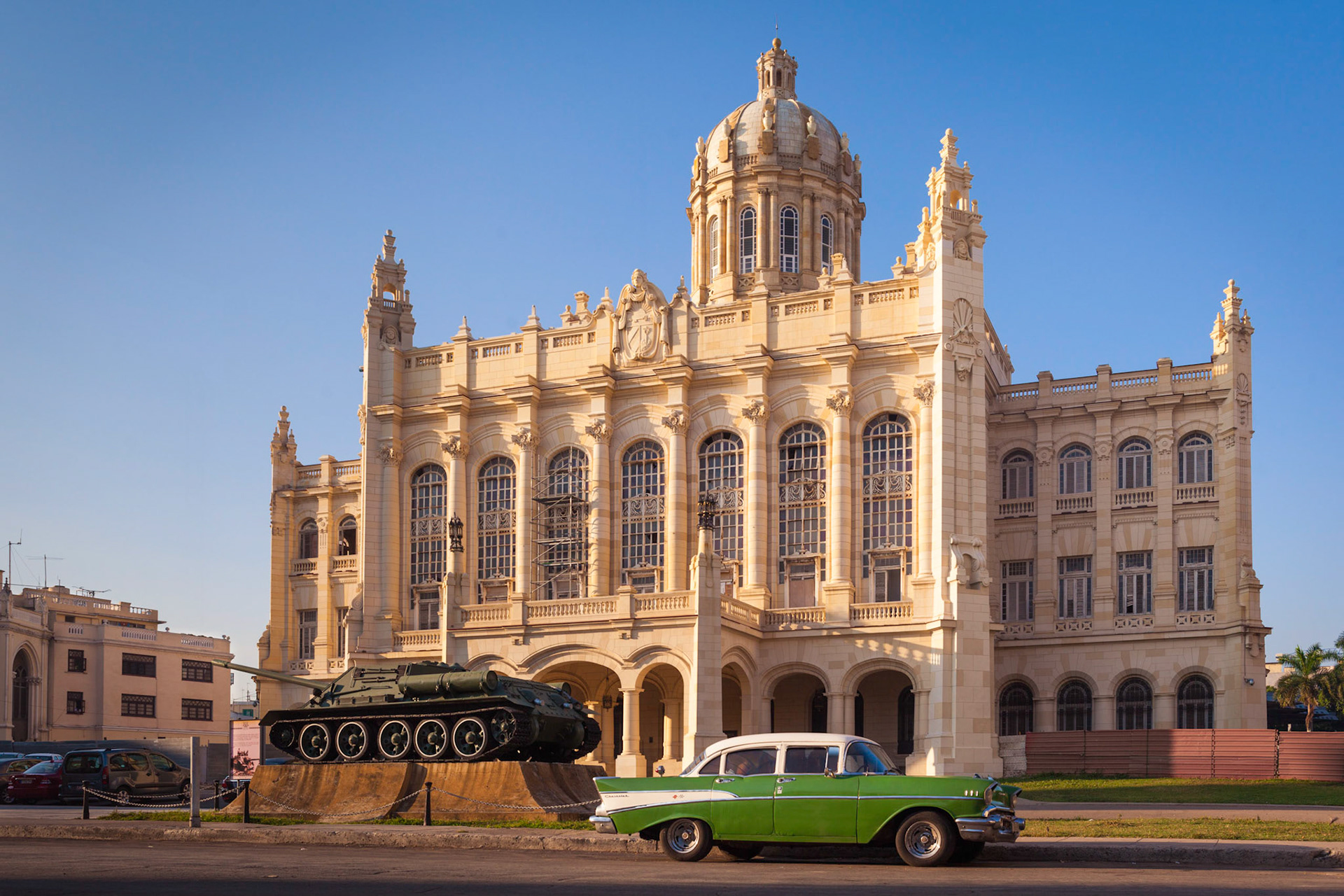 Museum of the revolution with the SU-100 Soviet tank destroyer and a 50s car parcked in front, Havana, Cuba