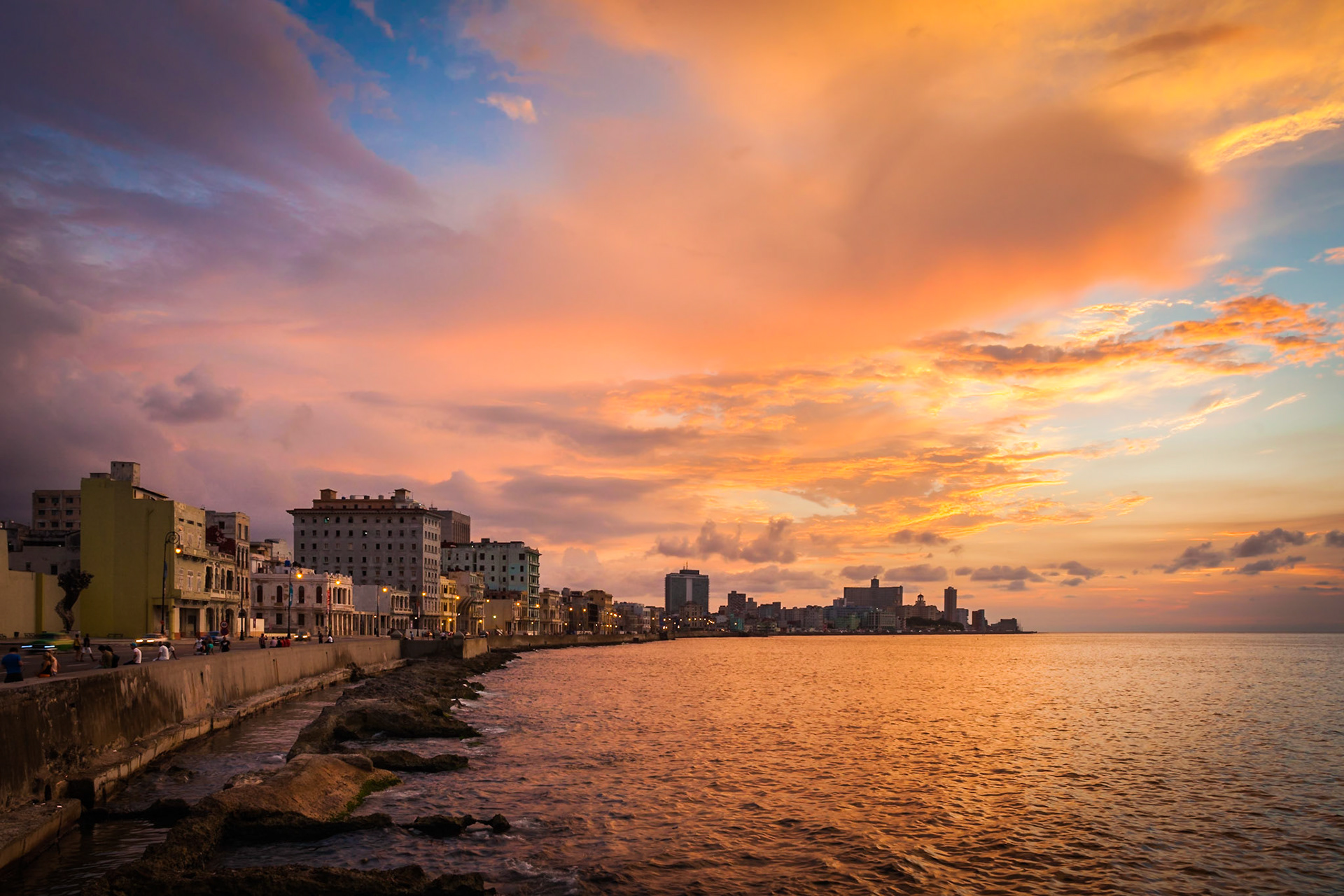 Sunset at Malecon, the famous Havana promenades where  Habaneros, lovers and most of all individual fishermen meet, Havana, Cuba