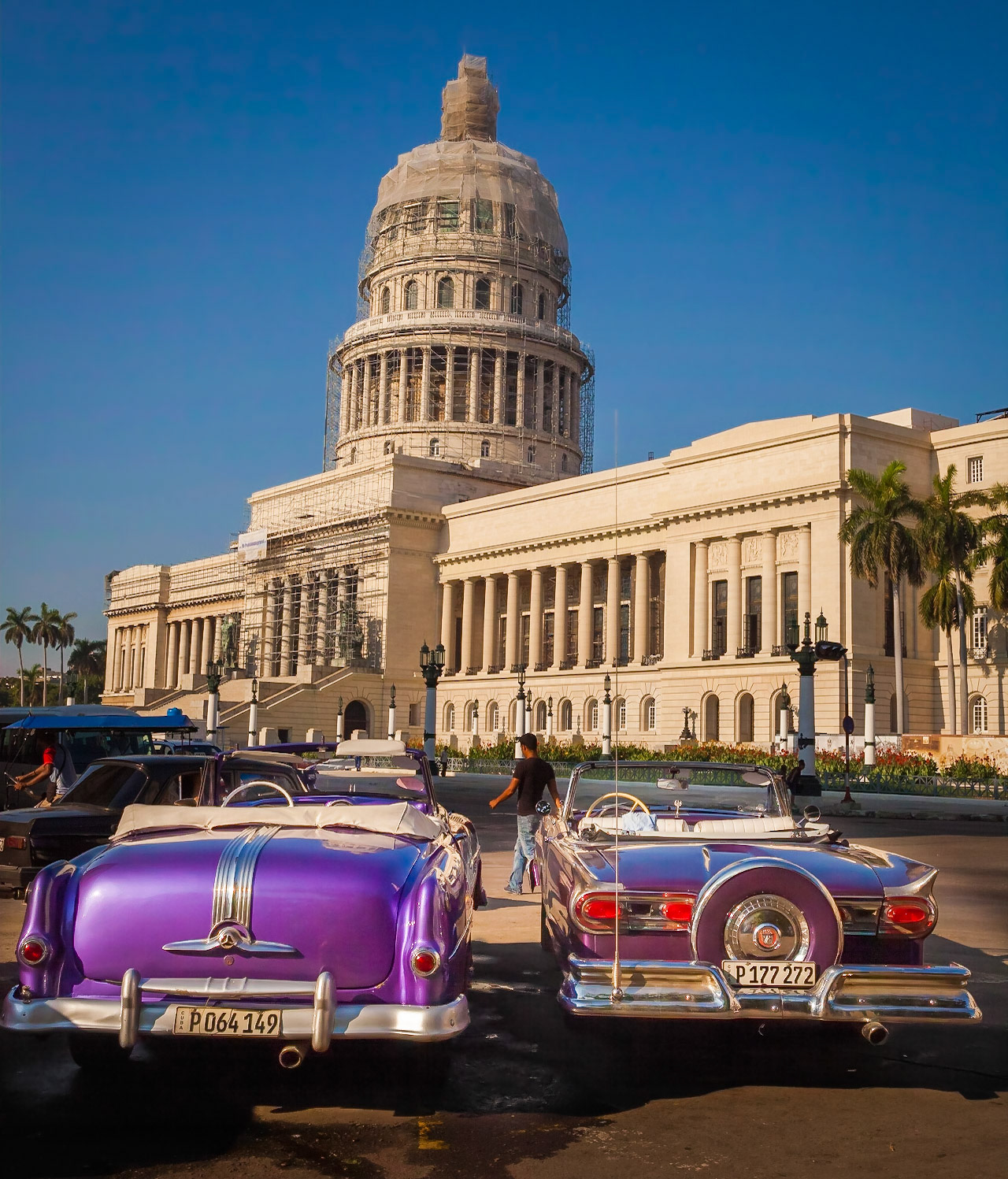 Vintage cars and the Capitol Building, Havana, Cuba
