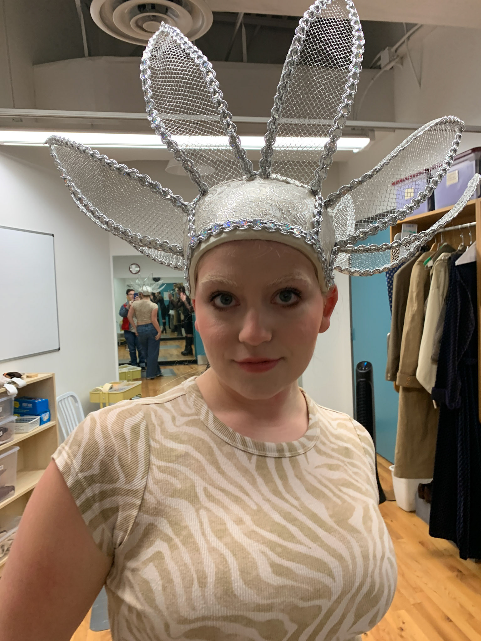 show girl cap prior to feathers