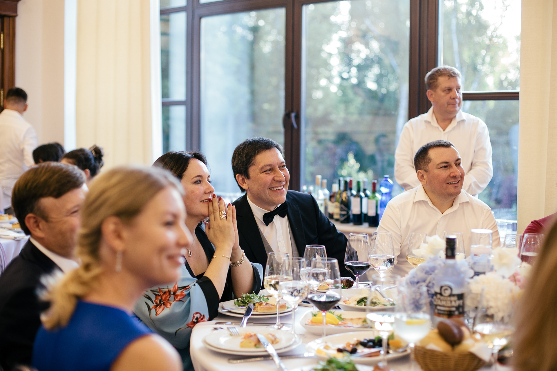 Friends and family raising a toast to the newlyweds