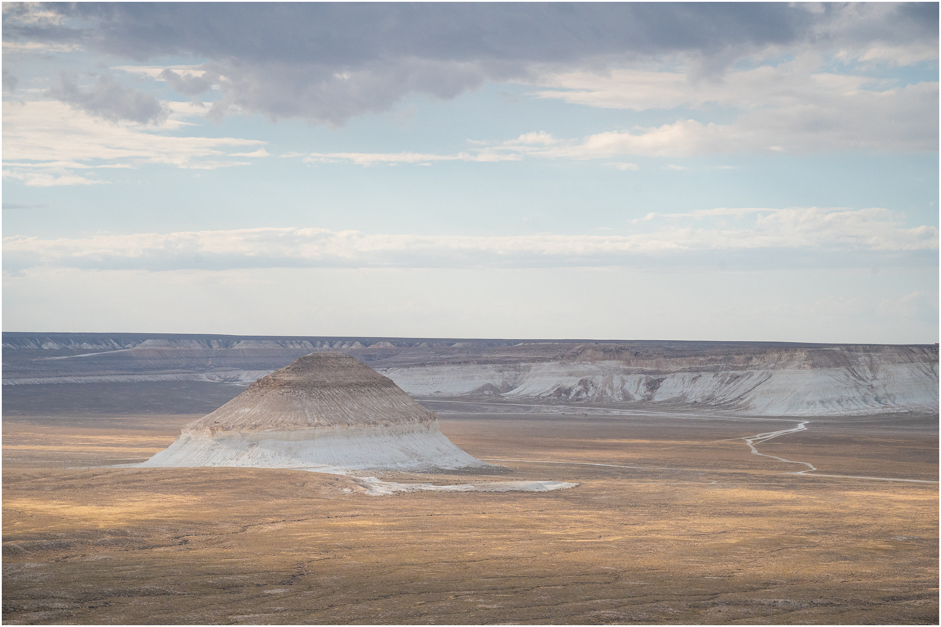 Yurt-like formation composed of salt and limestone sits in the middle of the desertland