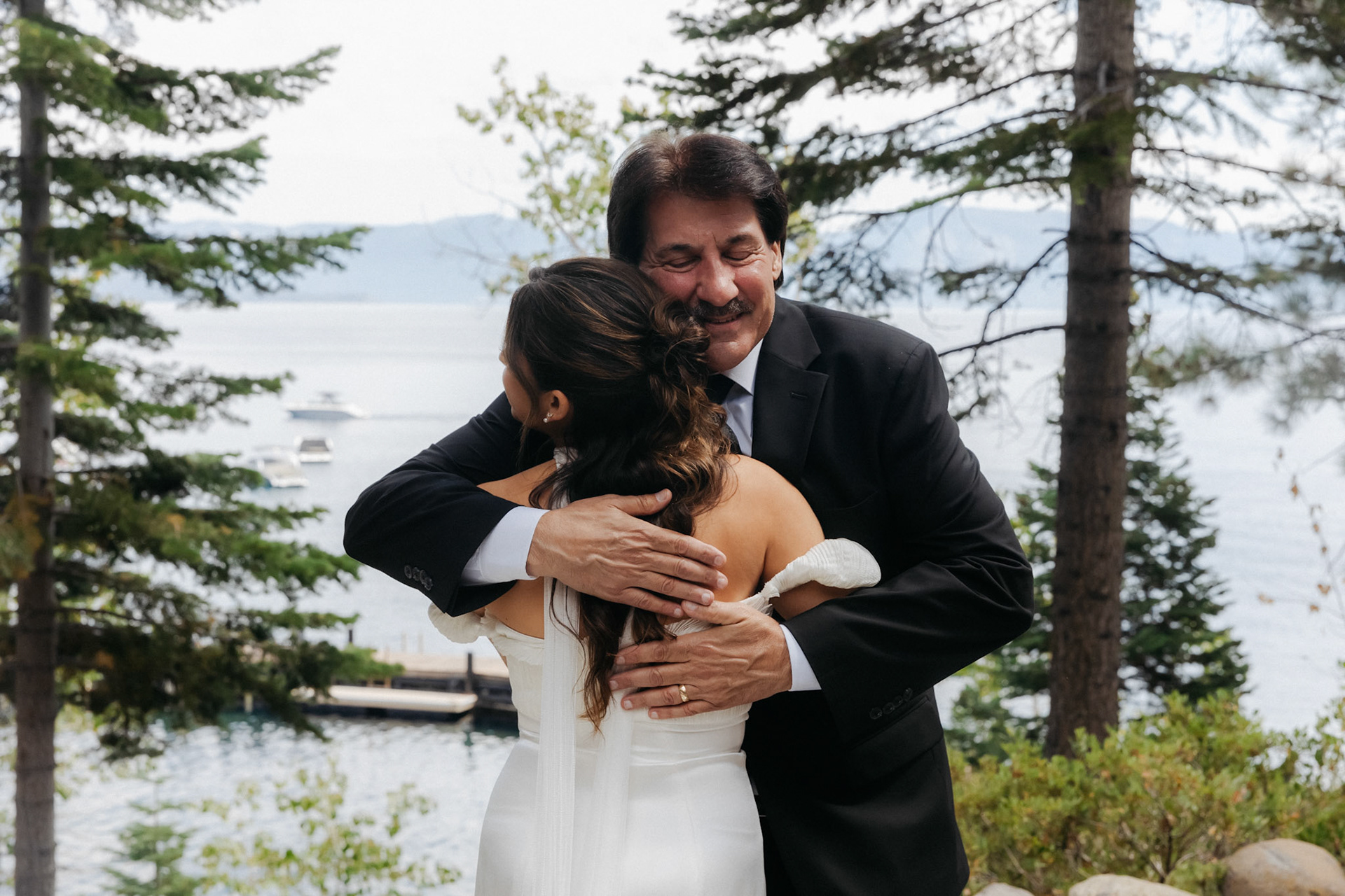 Cami and Tyler’s first look on a private dock overlooking Lake Tahoe.