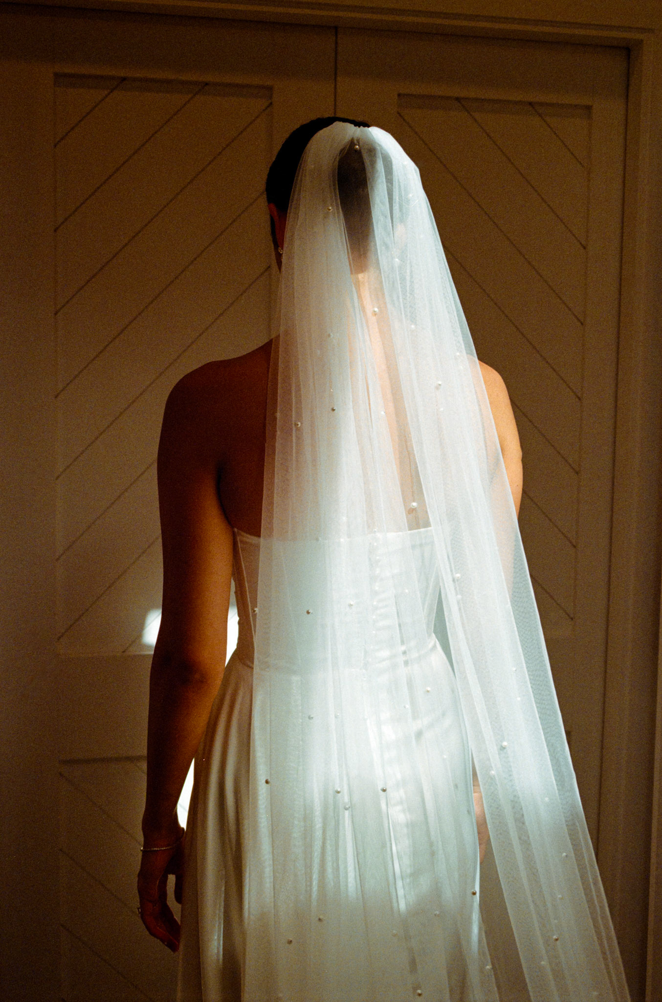A Julie Vino wedding gown and morning preparations photographed on film in Truckee.