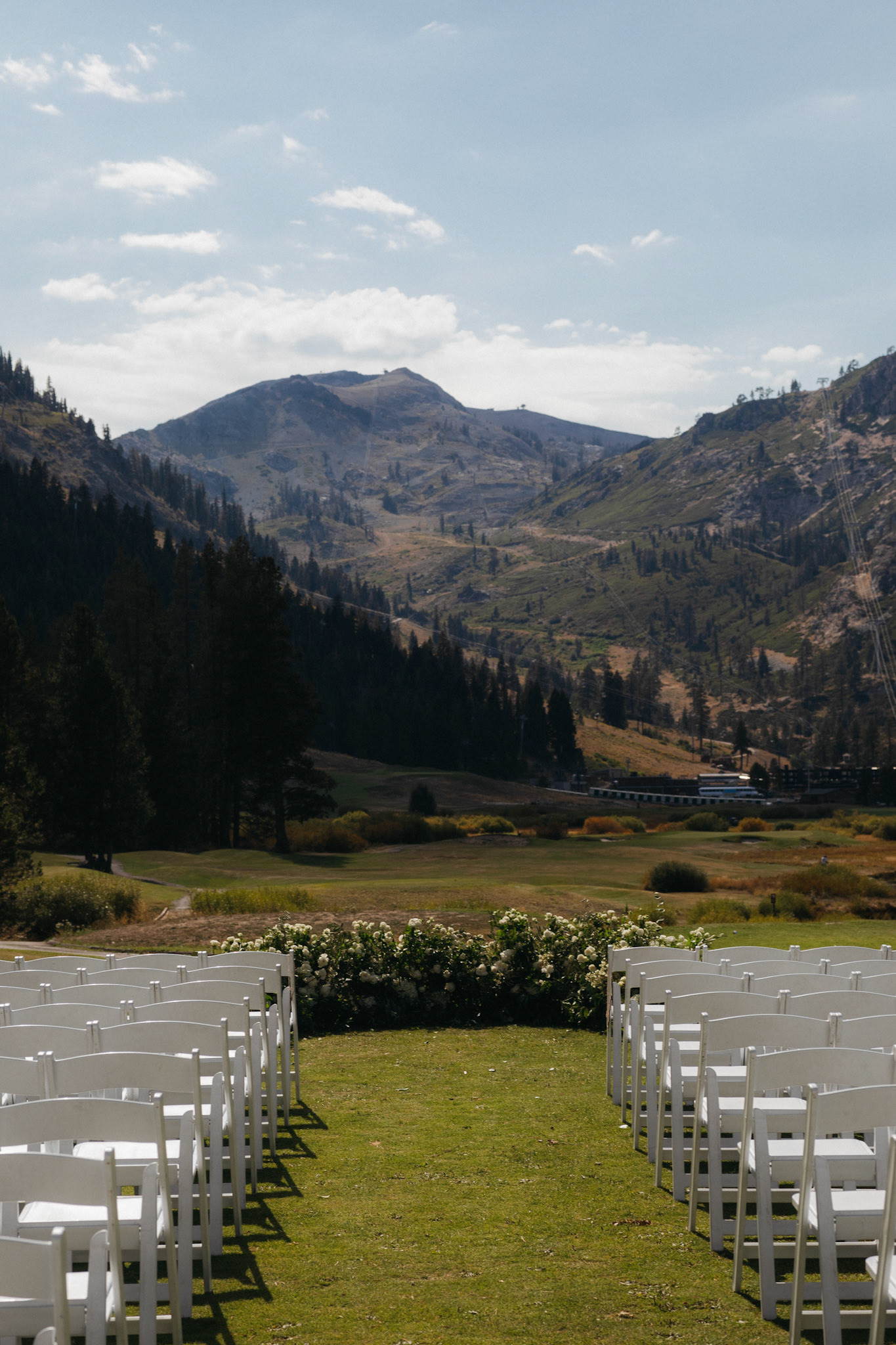 An outdoor mountain wedding ceremony at Everline Resort in Olympic Valley.