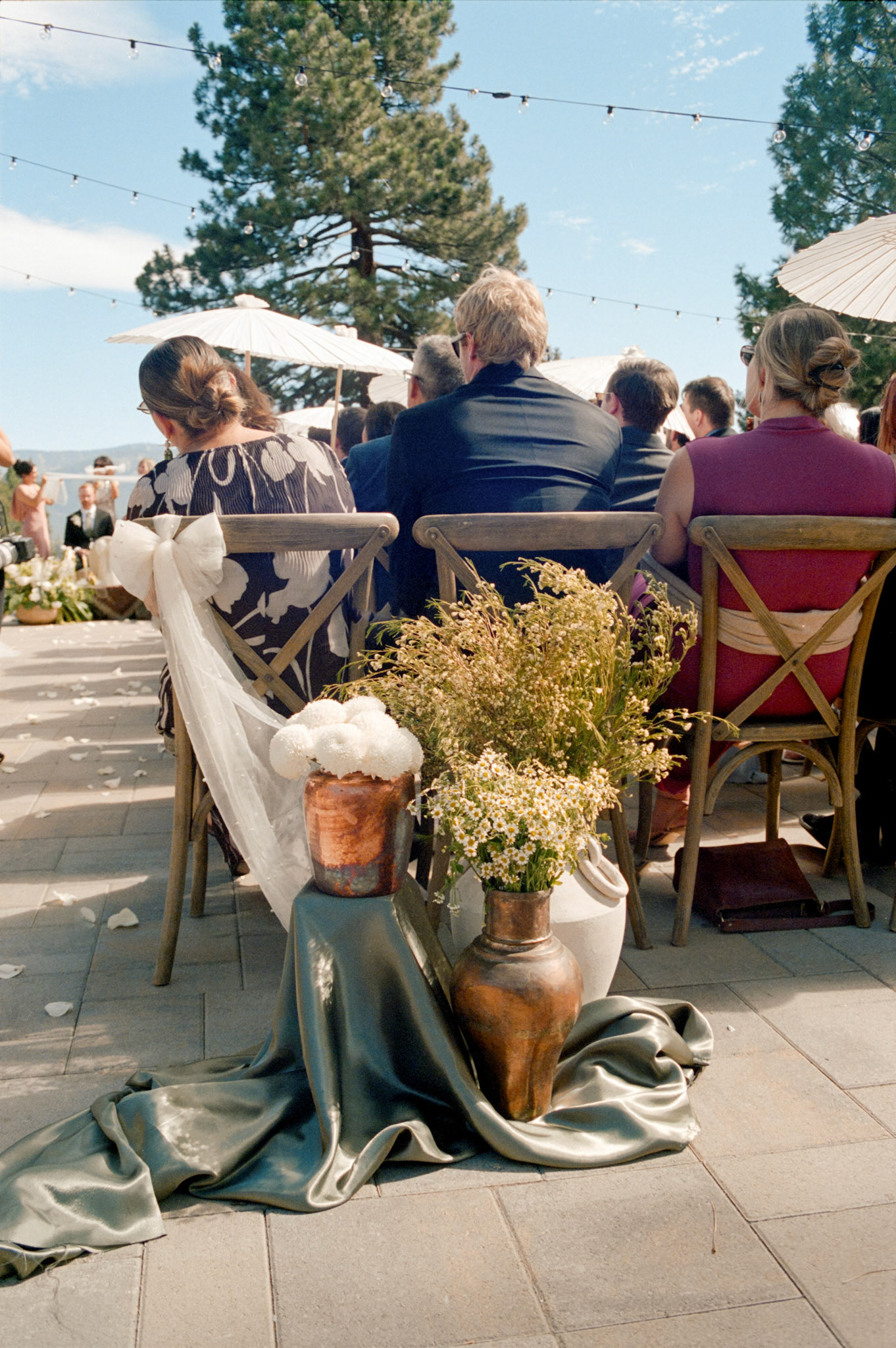 An open-air wedding ceremony beneath the pines at The Timbers at Old Greenwood.