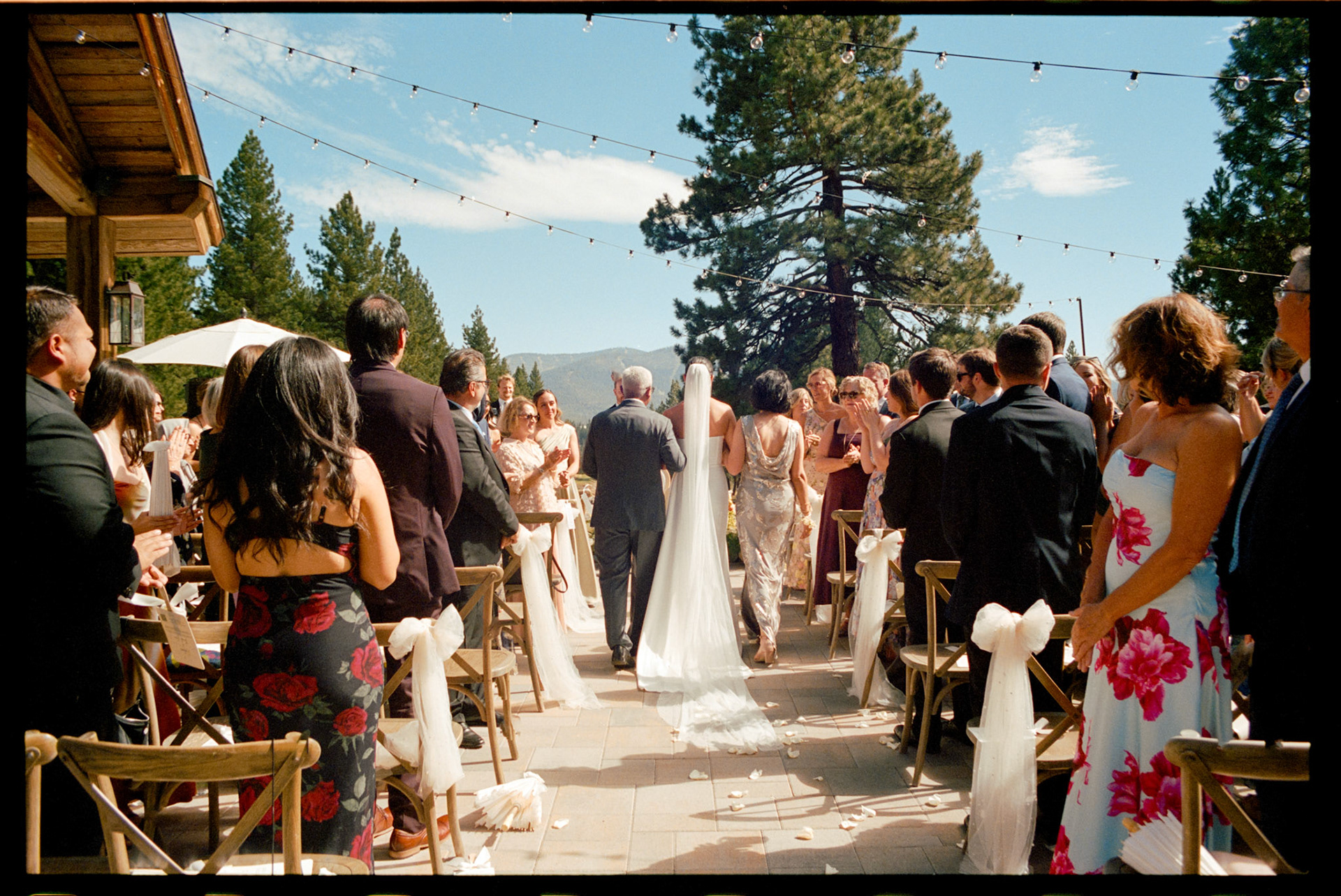 An open-air wedding ceremony beneath the pines at The Timbers at Old Greenwood.