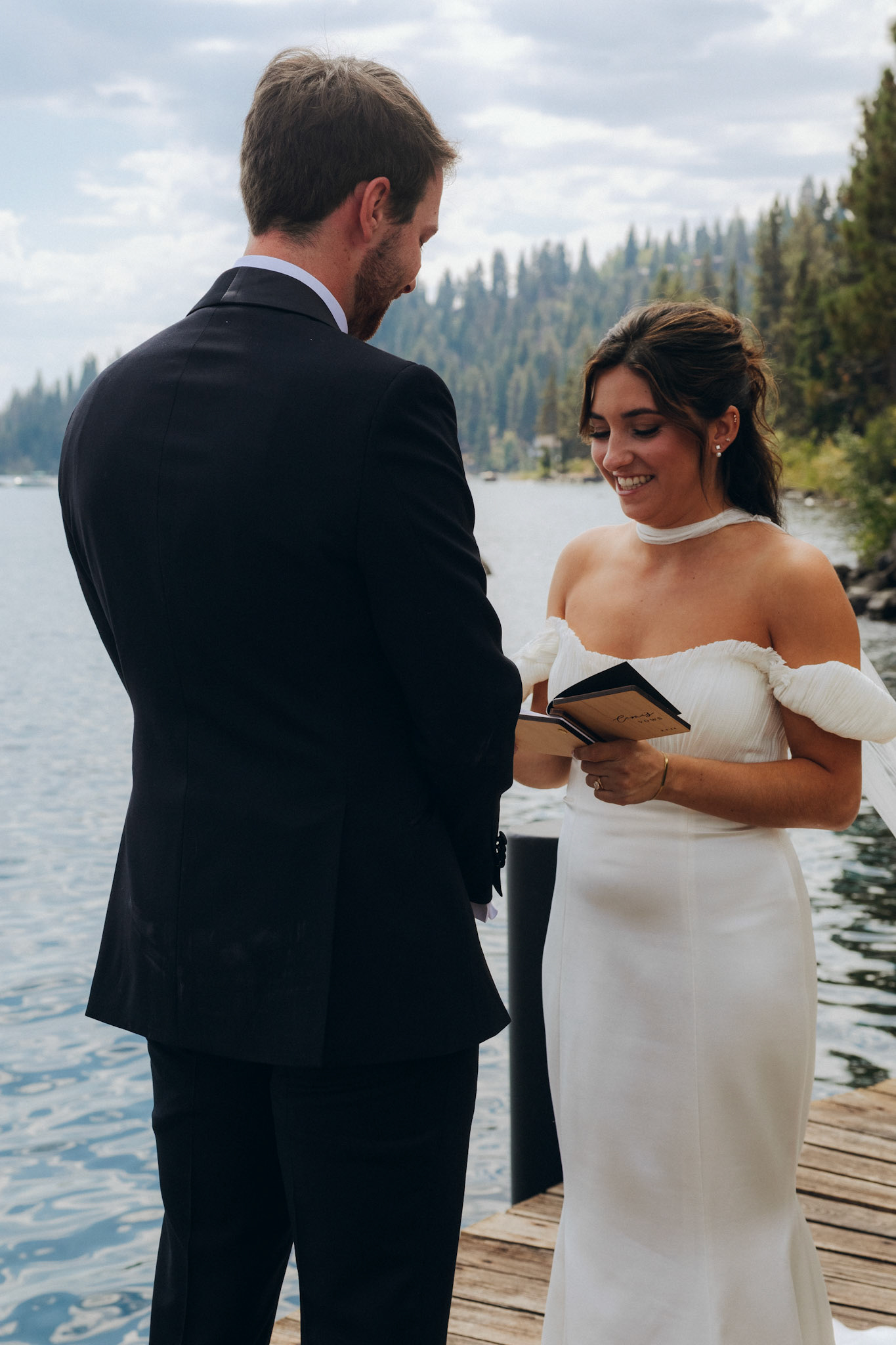 Cami and Tyler’s first look on a private dock overlooking Lake Tahoe.